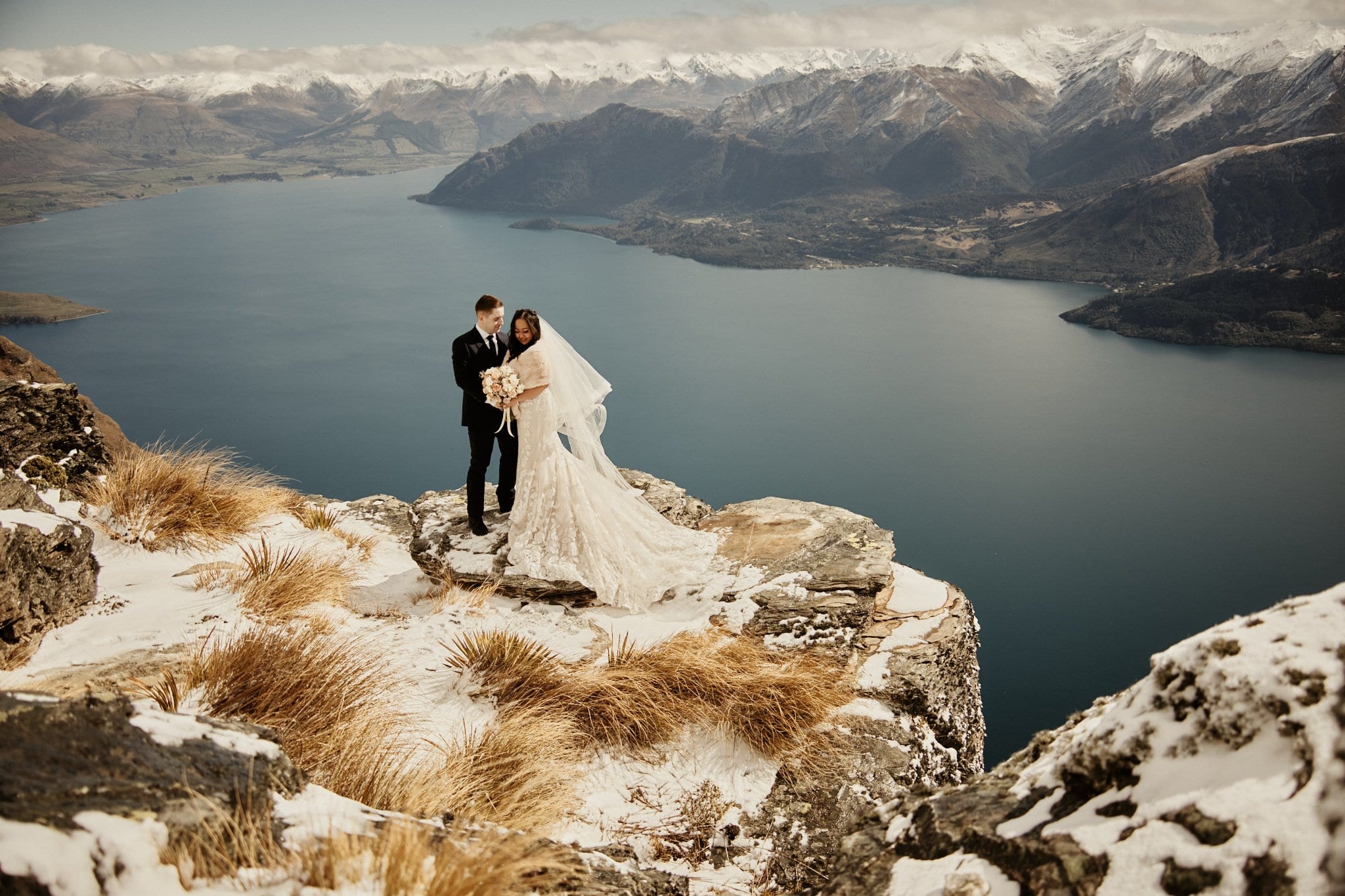 Keywords: bride, groom, mountain, lake.