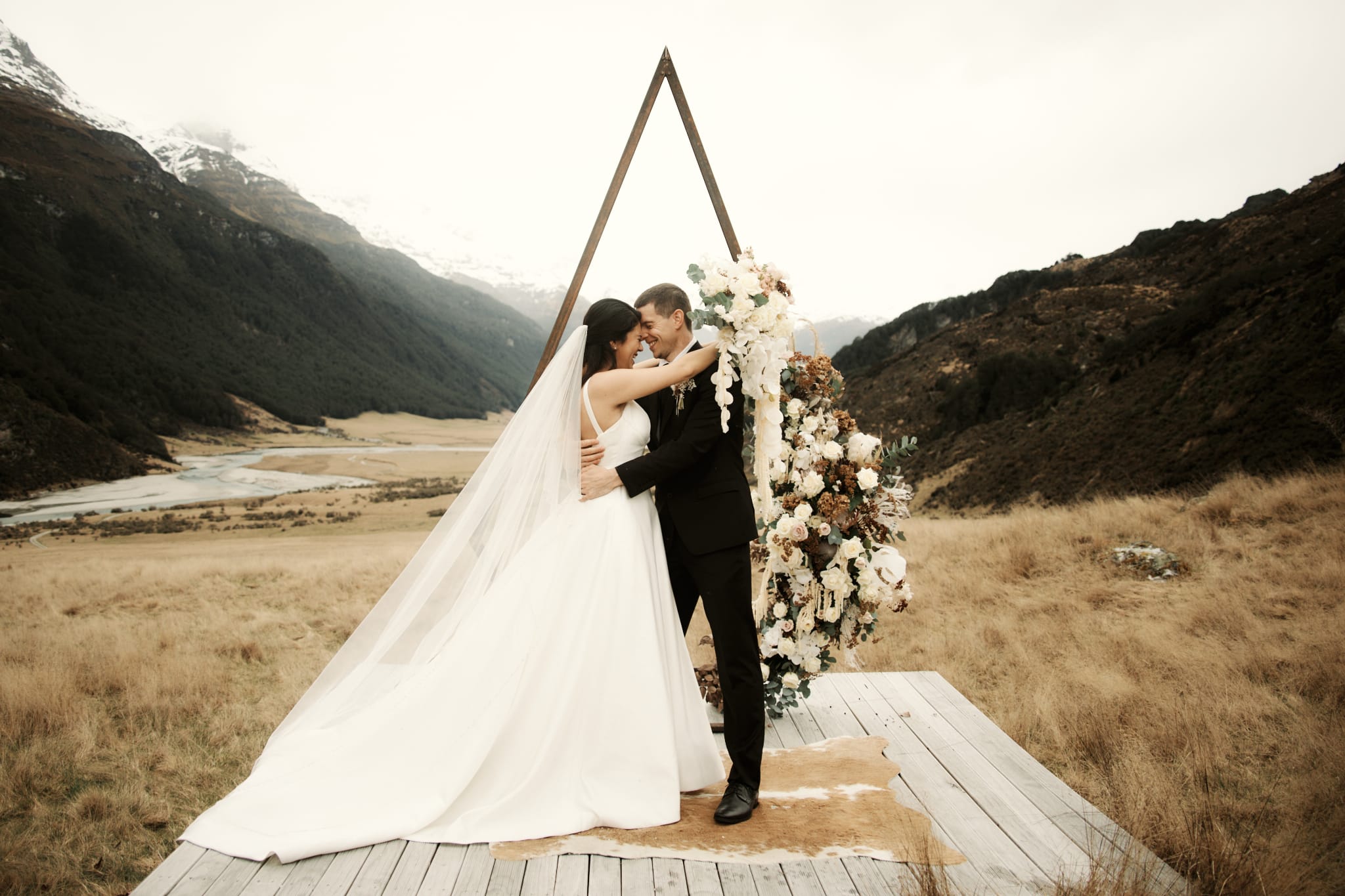 Queenstown New Zealand Elopement Wedding Photographer - Michelle and Vedran sharing a romantic kiss during their Rees Valley elopement in the mountains.