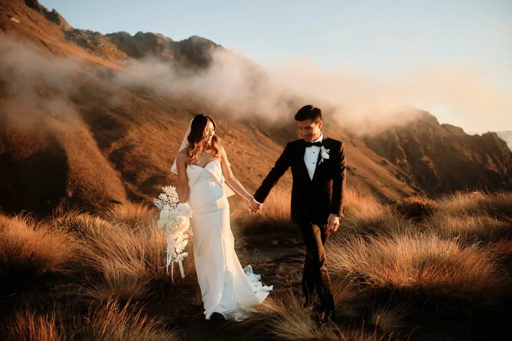 New Zealand elopement photographer capturing unforgettable moments in Queenstown NZ and Heli-Weddings at Cecil Peak.