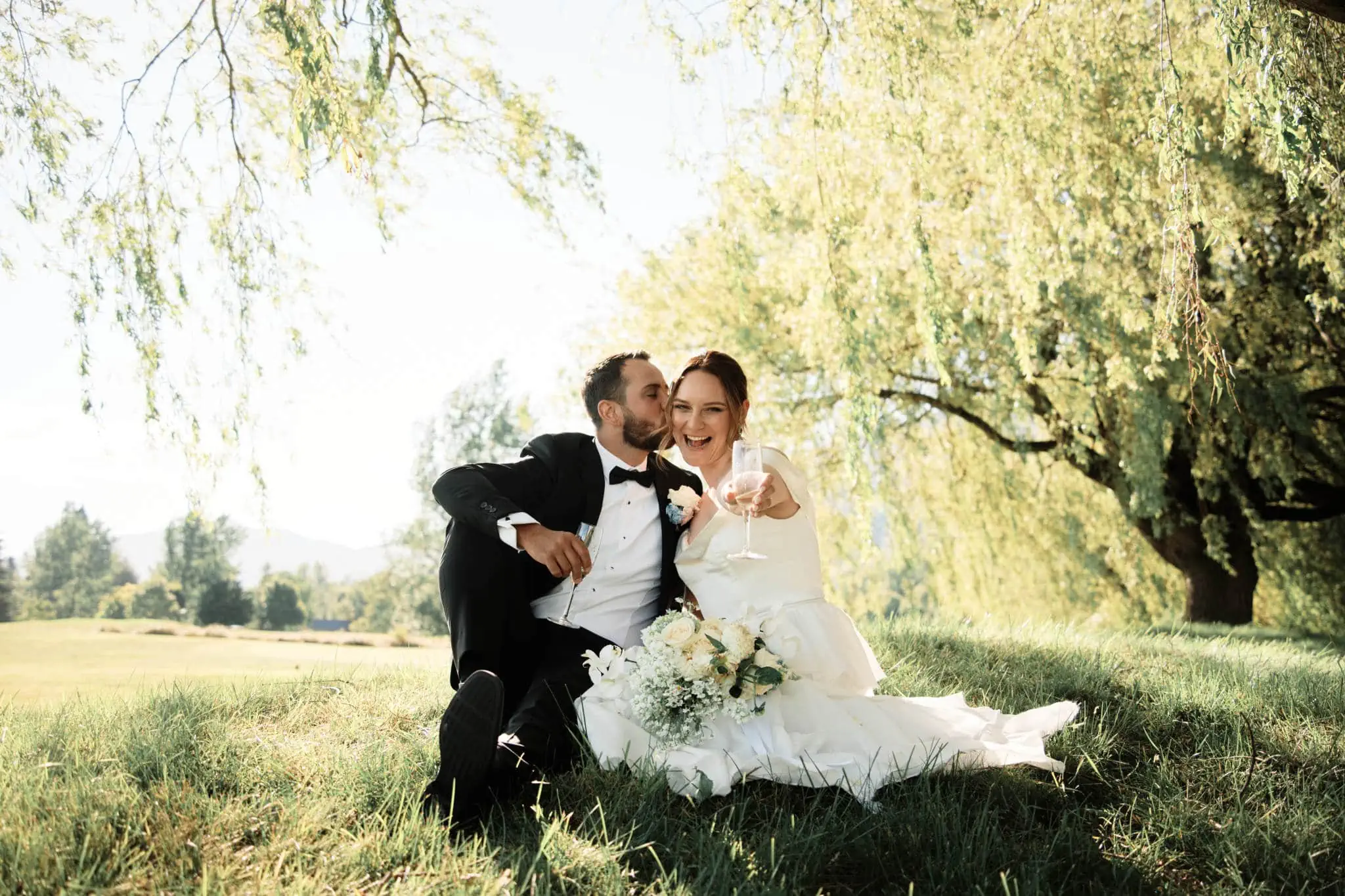 Sapphire and JJ's Queenstown Heli Elopement Wedding, captured under a willow tree.