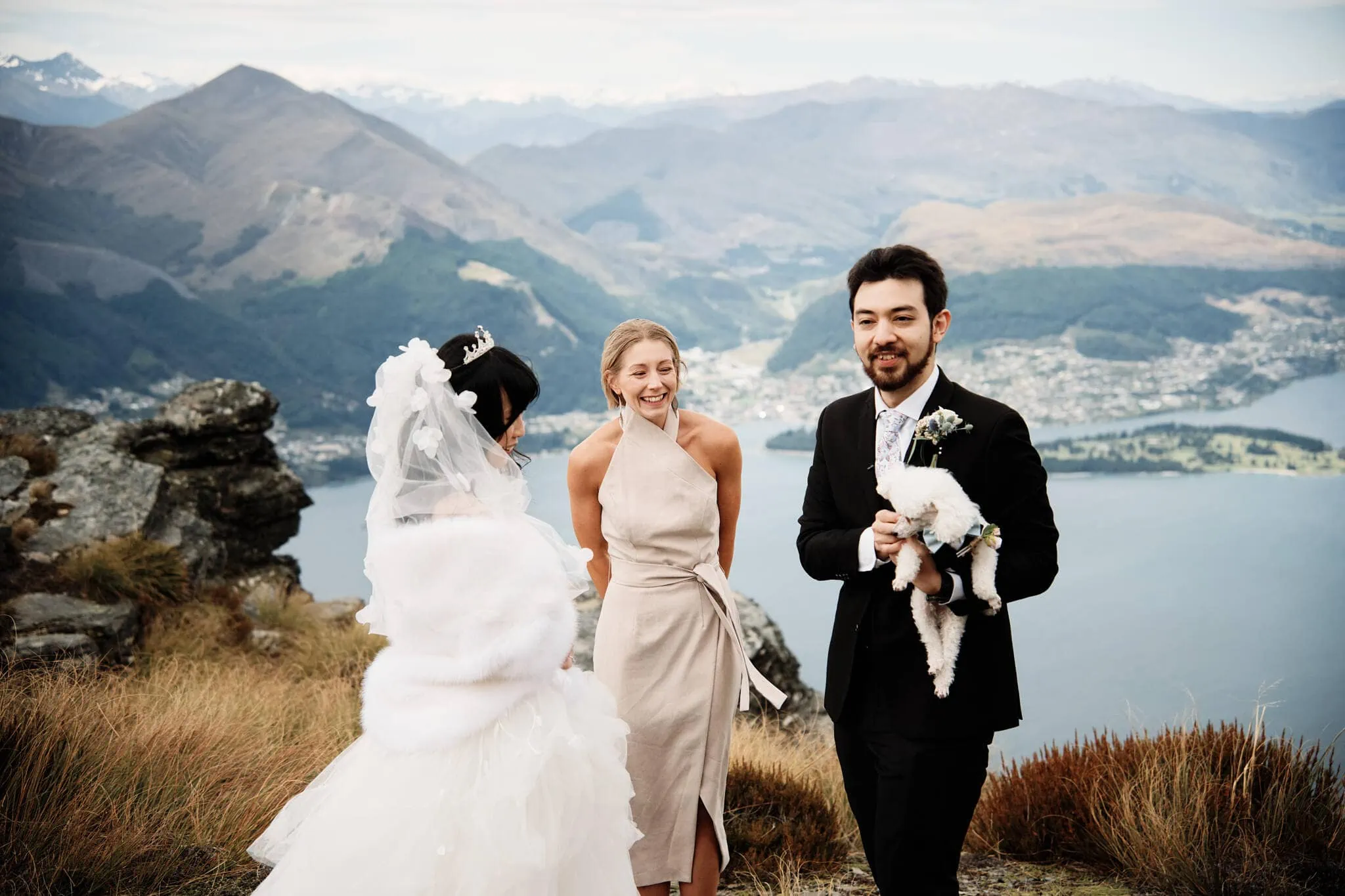Carlos and Wanzhu's intimate elopement wedding on top of Cecil Peak, overlooking Lake Wanaka.