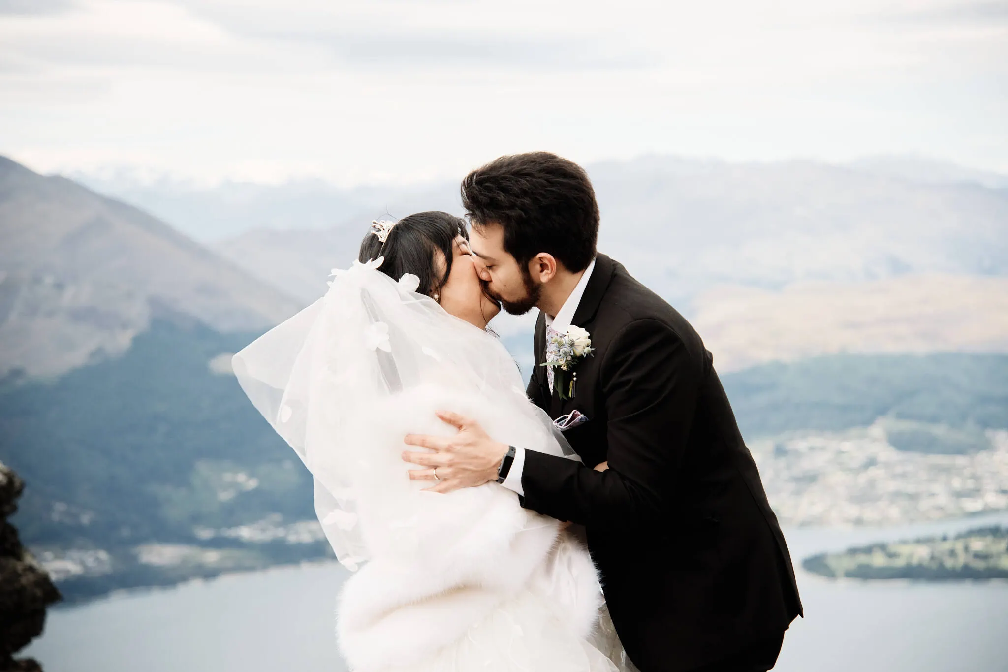 Carlos and Wanzhu have an intimate heli elopement wedding on top of Cecil Peak, overlooking Lake Wanaka.