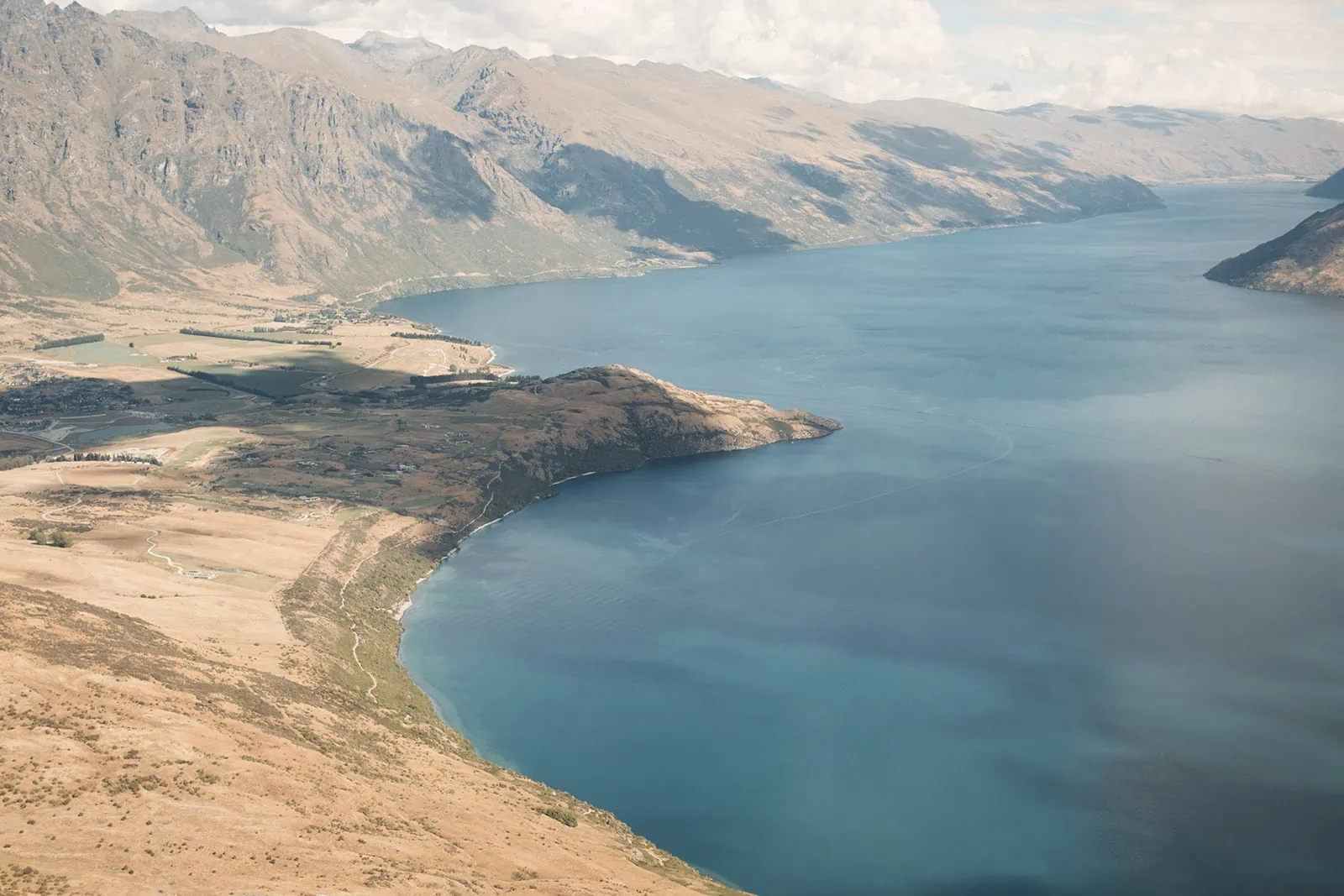 Aerial view of Lake Wakawaka, New Zealand featuring Queenstown Heli Pre Wedding at Cecil Peak.