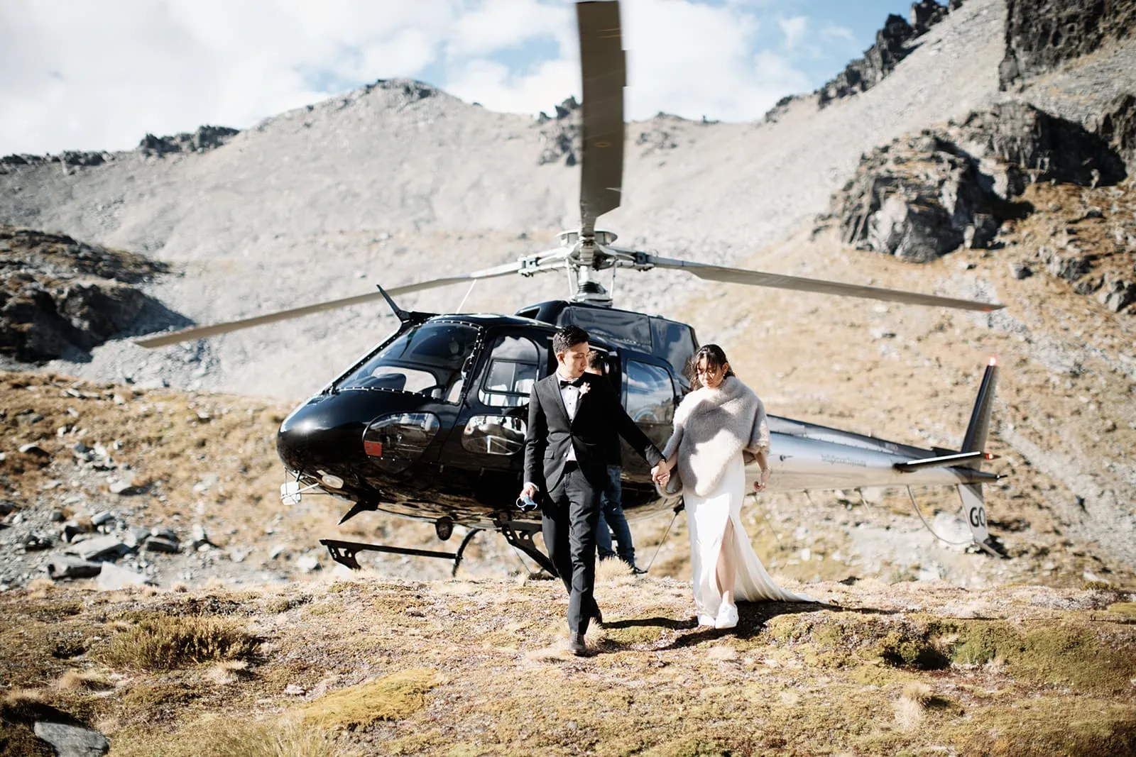 Bride and groom | helicopter | mountains.