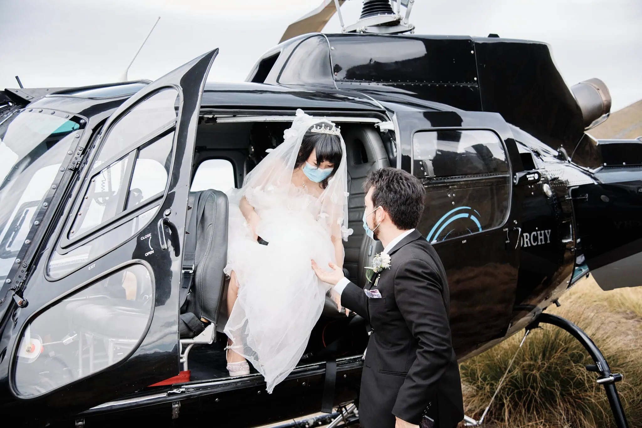 Newlyweds Carlos and Wanzhu experience an intimate heli elopement wedding on Cecil Peak.