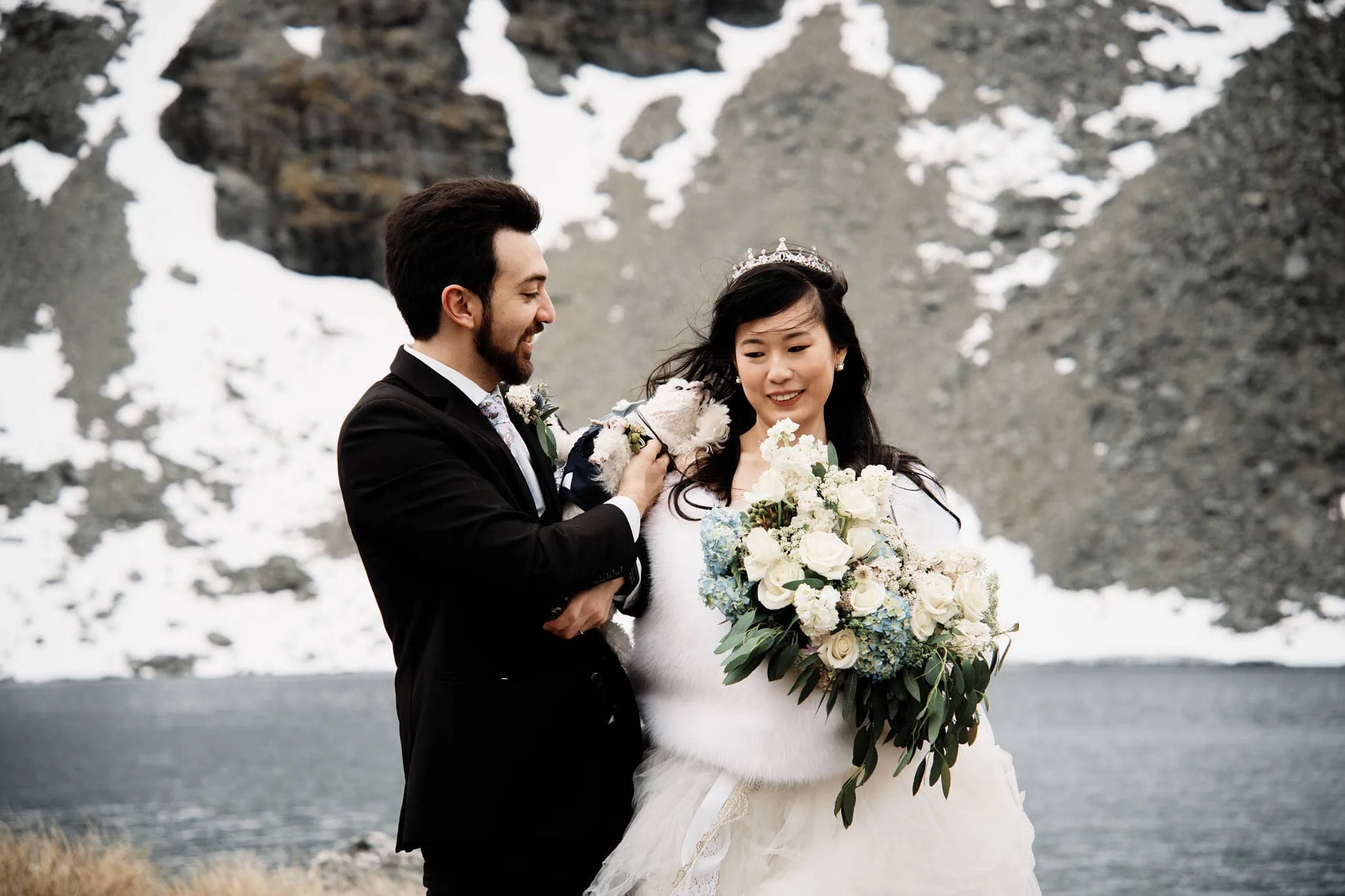 Carlos and Wanzhu's intimate heli elopement wedding with mountains in the background.