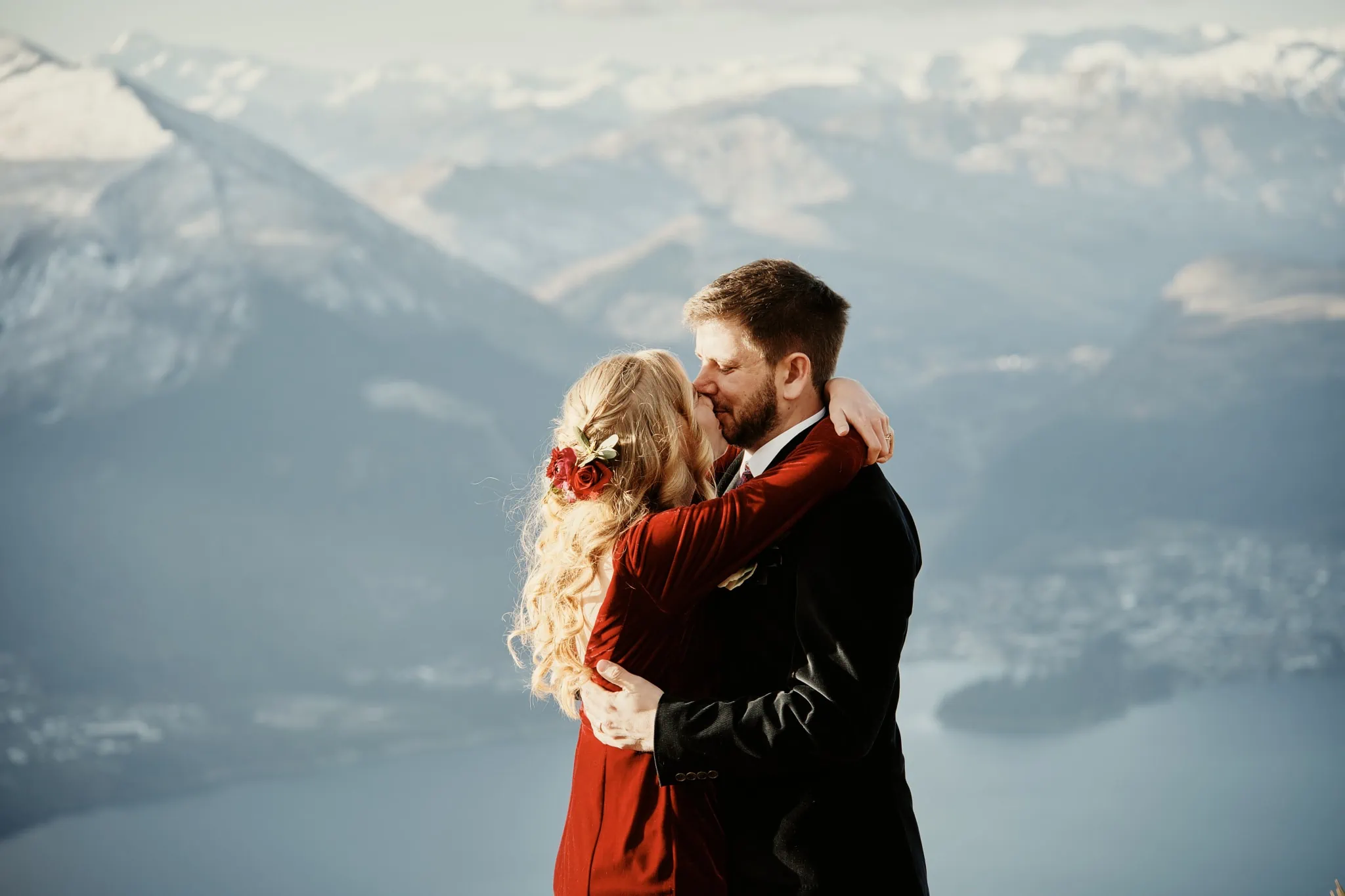 Claire and Rob embracing during their Heli Elopement Wedding on Cecil Peak.