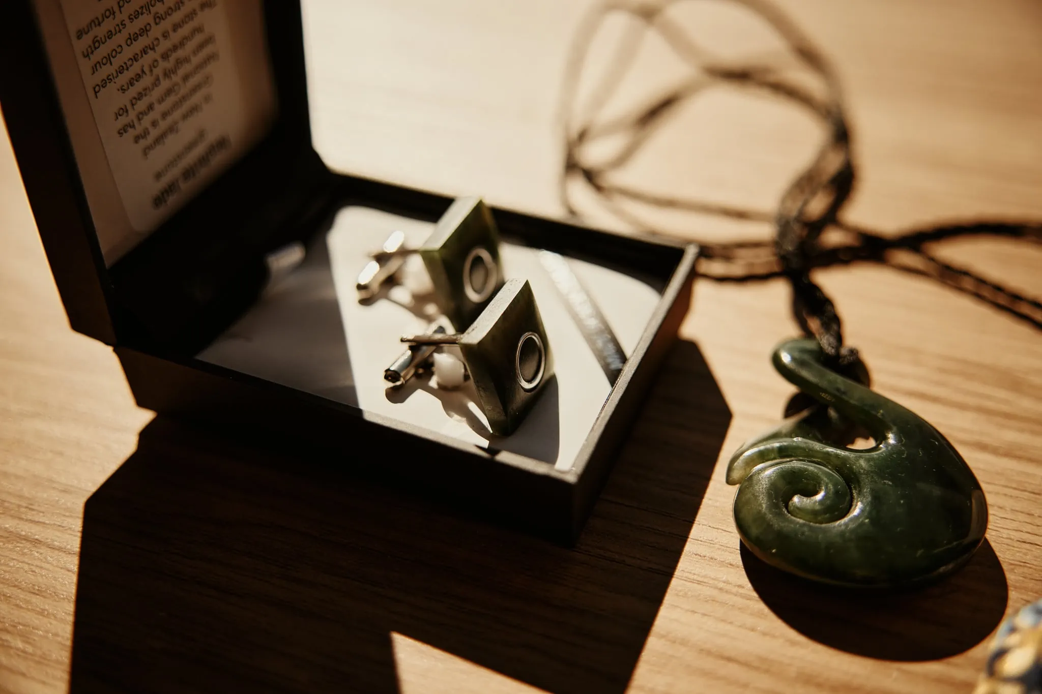 Claire and Rob's Heli Elopement Wedding at Cecil Peak included a stunning pair of earrings and a necklace in a box.
