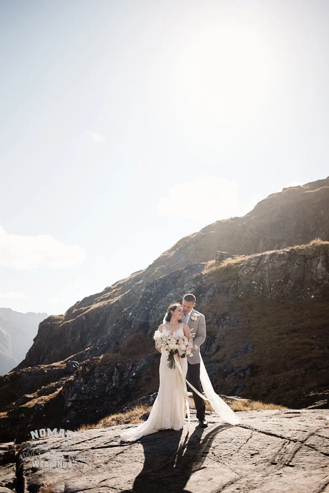 Amy and Eden's enchanting heli elopement wedding at Lake Erskine in the mountains.