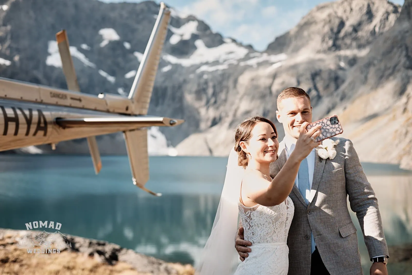 Amy and Eden capture an enchanting selfie at their Lake Erskine heli elopement wedding.