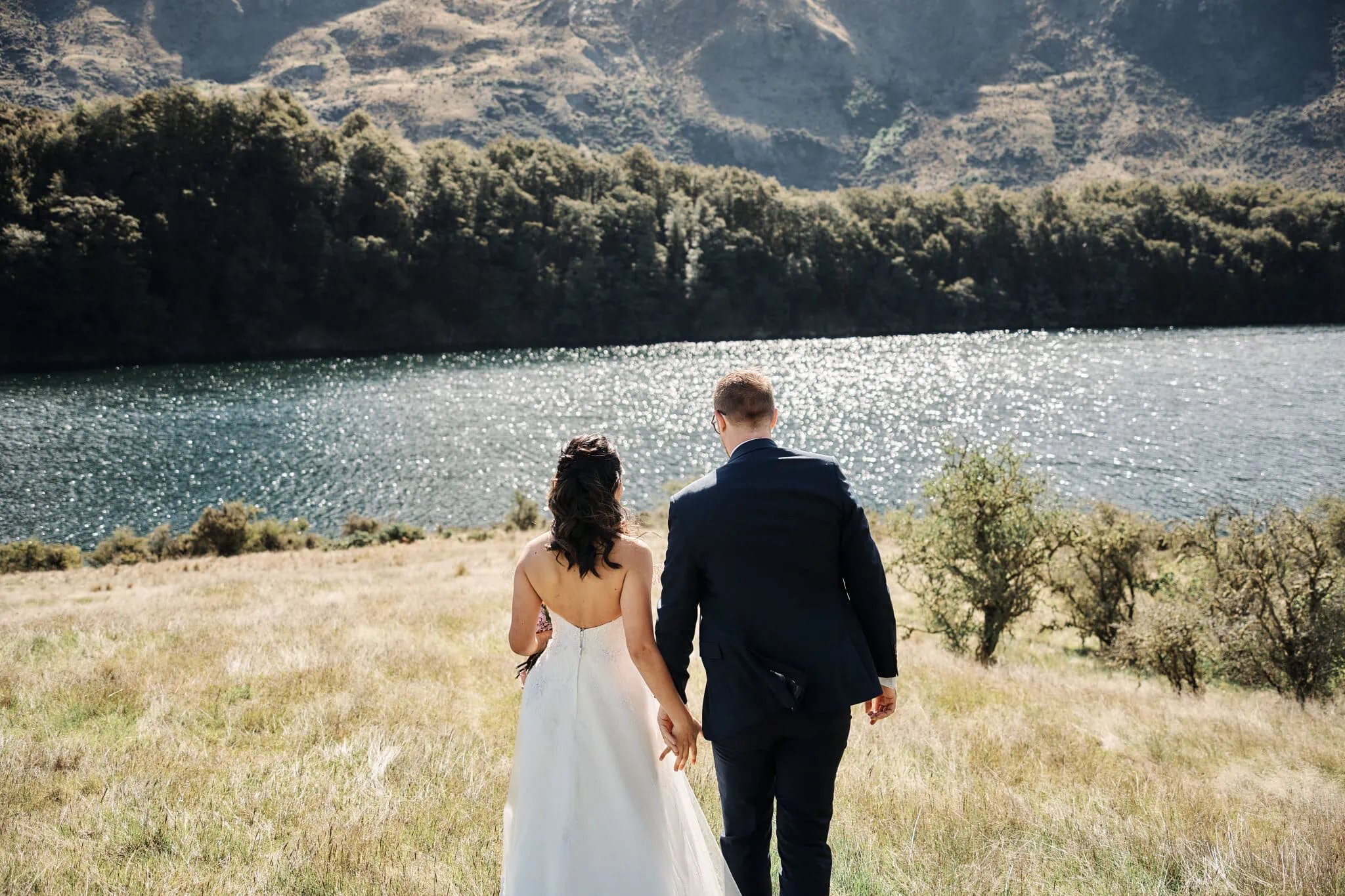 Ace and Alex's pre-wedding shoot at Moke Lake, a grassy field near a lake.