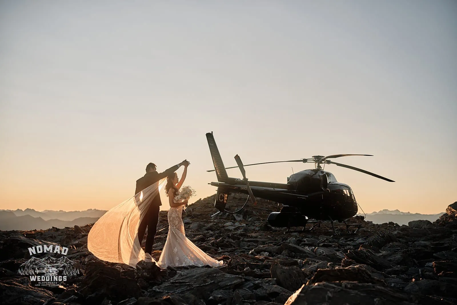Connie and Andrew's remarkable pre-wedding shoot features a helicopter, sunset backdrop.