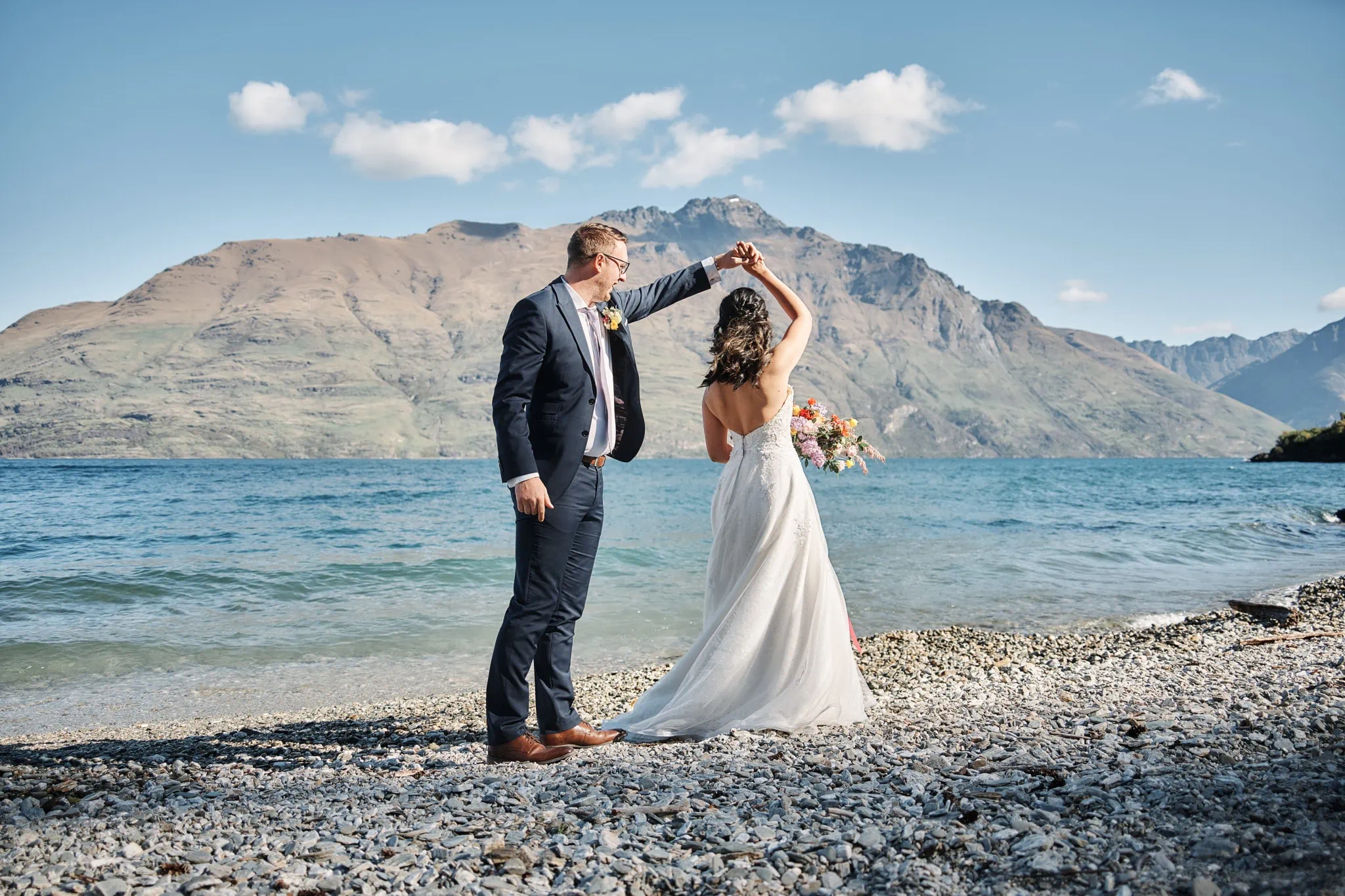 Ace and Alex having a pre wedding shoot on the shore of Moke Lake.
