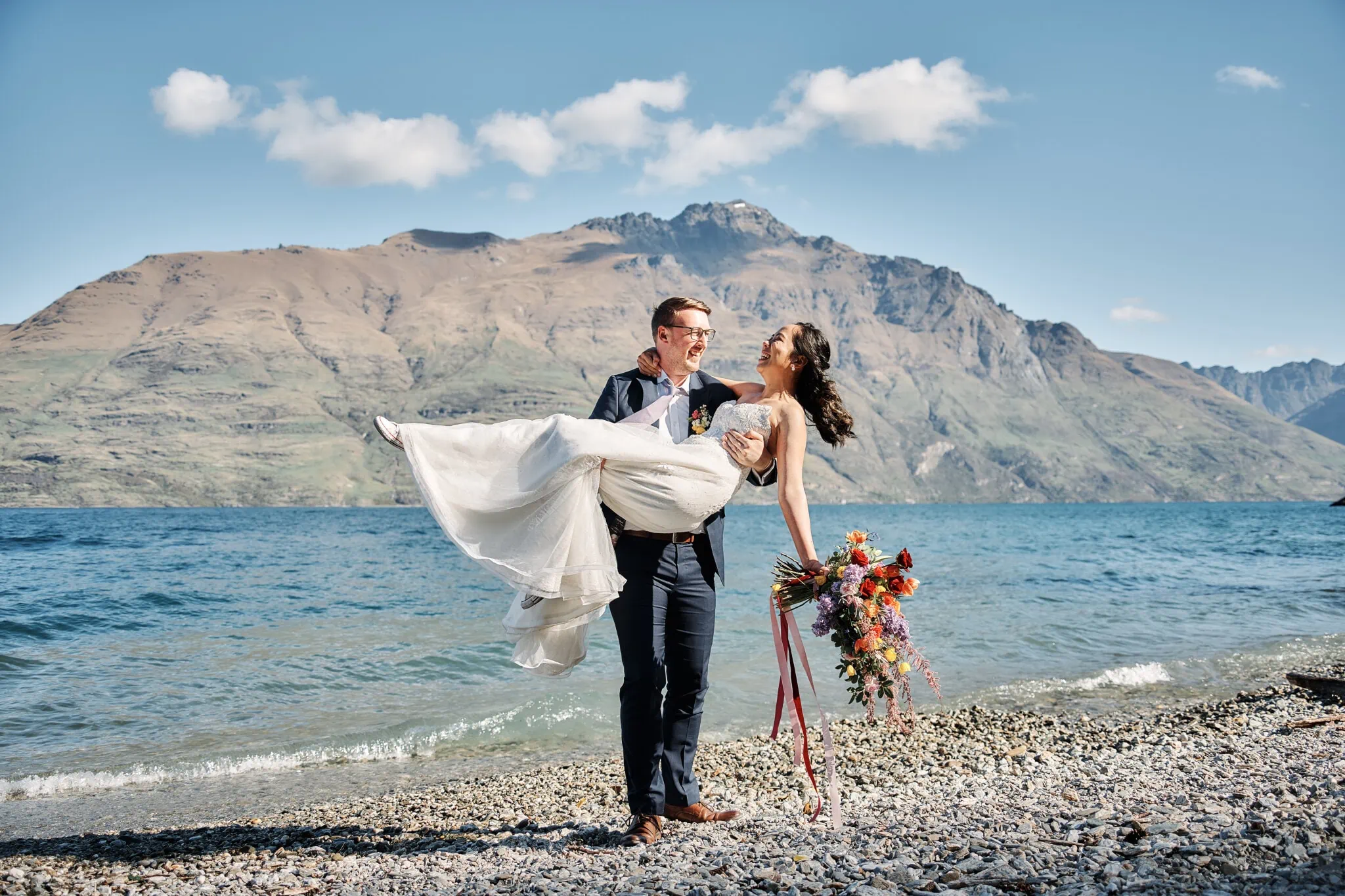 Ace and Alex in a loving embrace during their Moke Lake pre-wedding shoot.