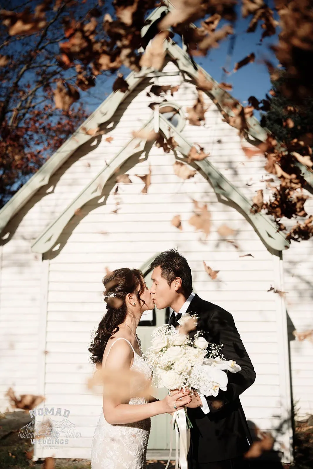 Connie and Andrew have a remarkable pre-wedding shoot in front of a white church.