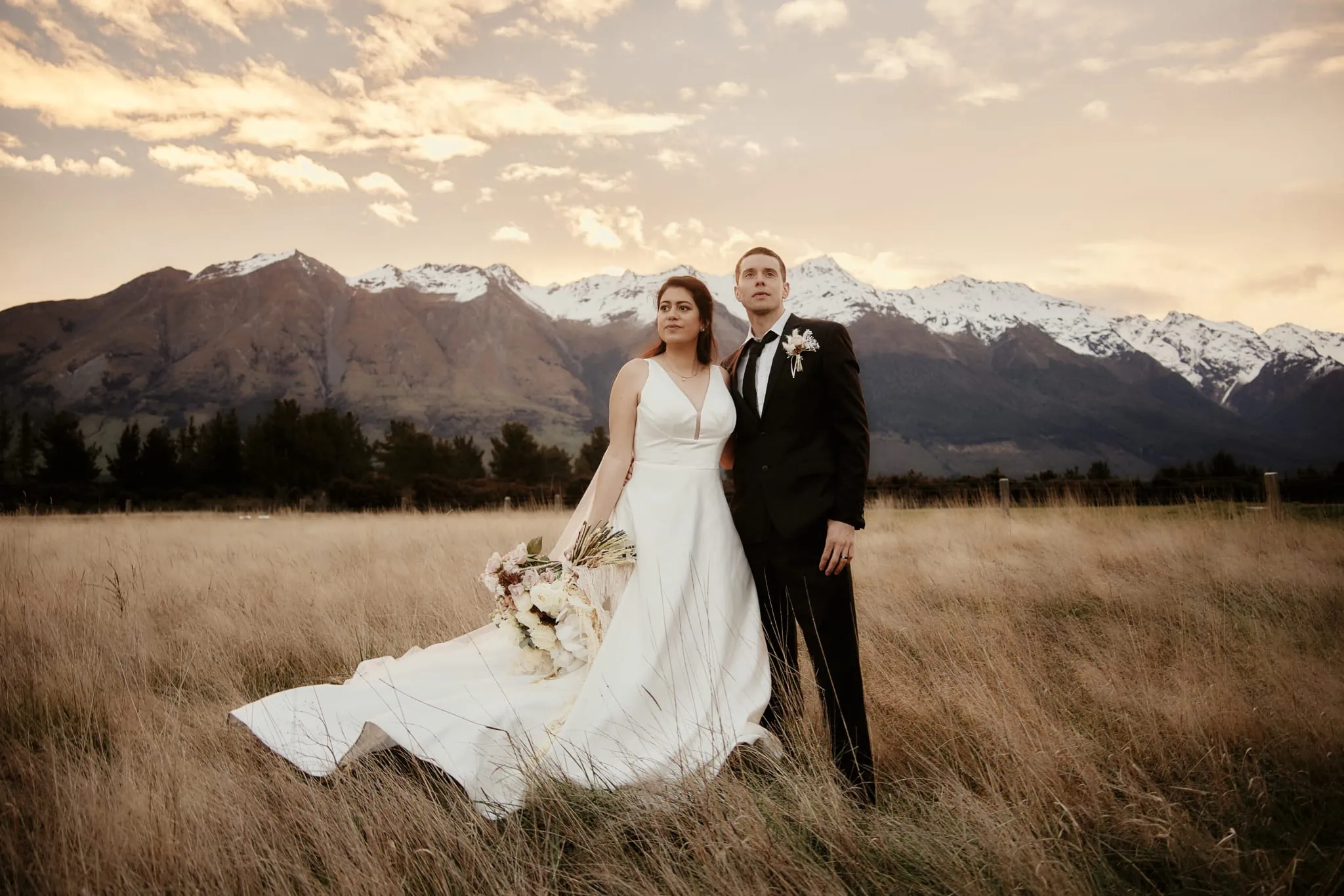 Michelle and Vedran's elopement wedding at Rees Valley Station, with mountains in the background.