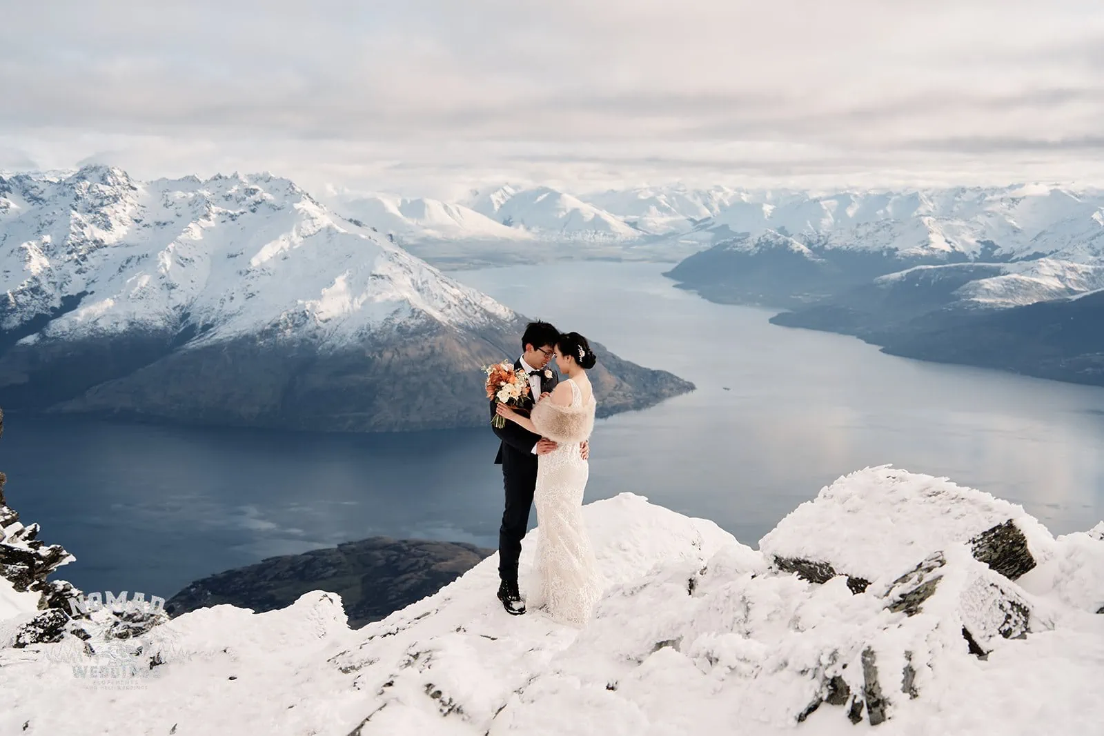 A pre-wedding shoot featuring Joanna and Tony on a snow covered mountain in Queenstown, New Zealand.