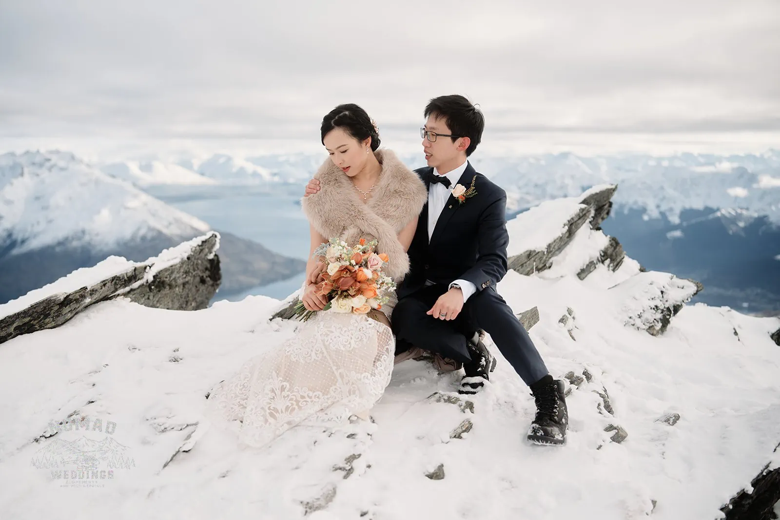 Queenstown, New Zealand: Joanna and Tony captured in a snowy mountaintop during their pre-wedding shoot.