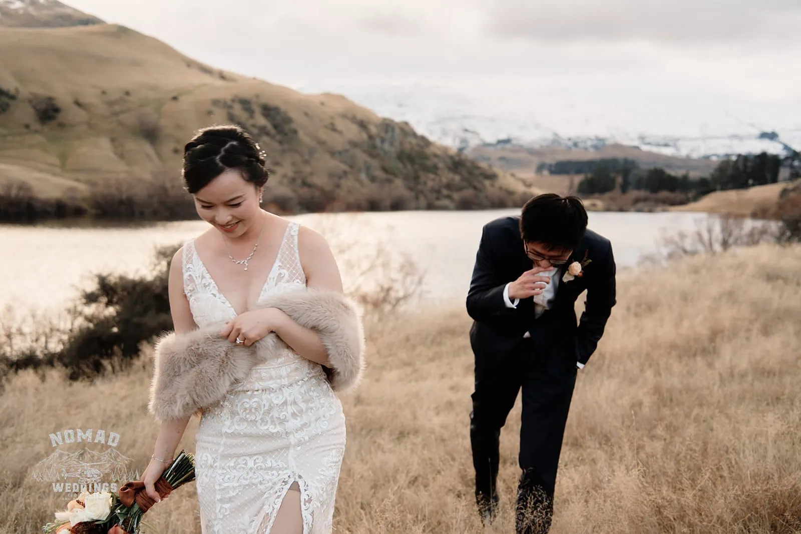 Joanna and Tony's pre-wedding shoot in Queenstown, New Zealand, captures them standing in a field near a lake.
