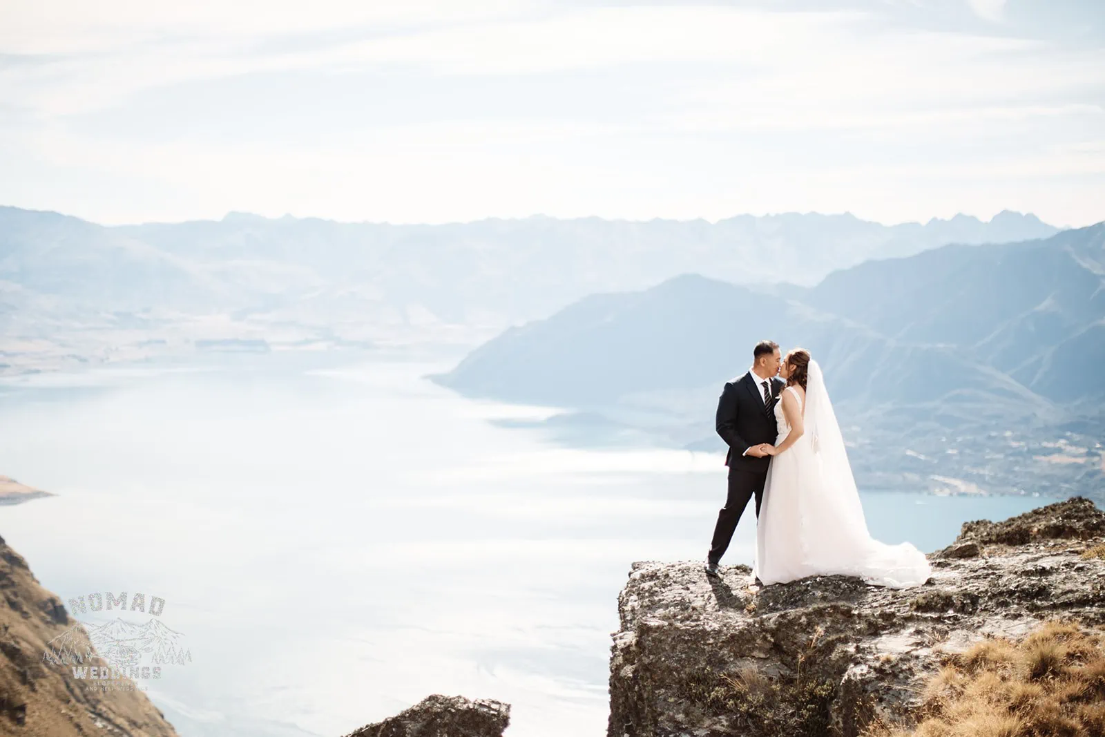 Nhi & Nicholas' Queenstown NZ pre-wedding shoot on top of Cecil Peak overlooking Lake Wanaka.