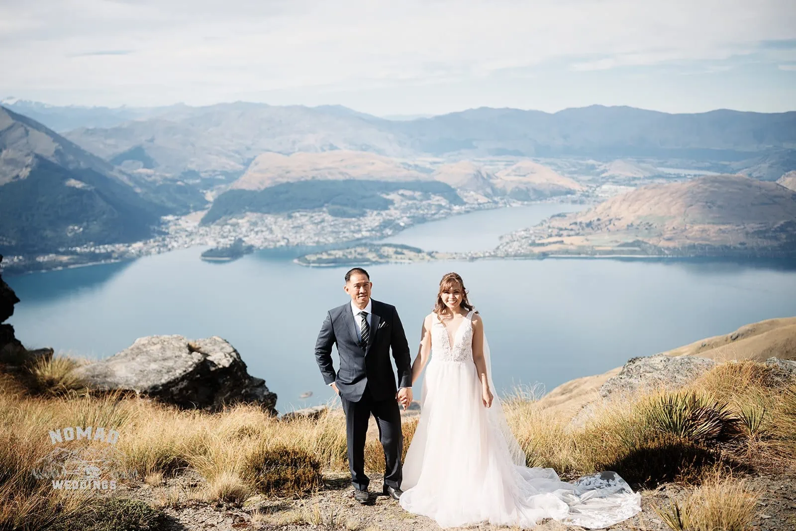 Nhi & Nicholas' Queenstown pre-wedding shoot atop a mountain overlooking Lake Wanaka.