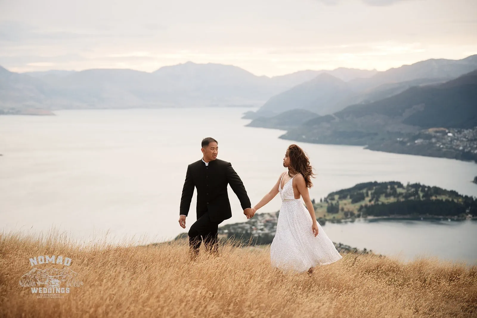 Nhi & Nicholas' pre-wedding shoot on Queenstown's grassy hill overlooking lake Wanaka.