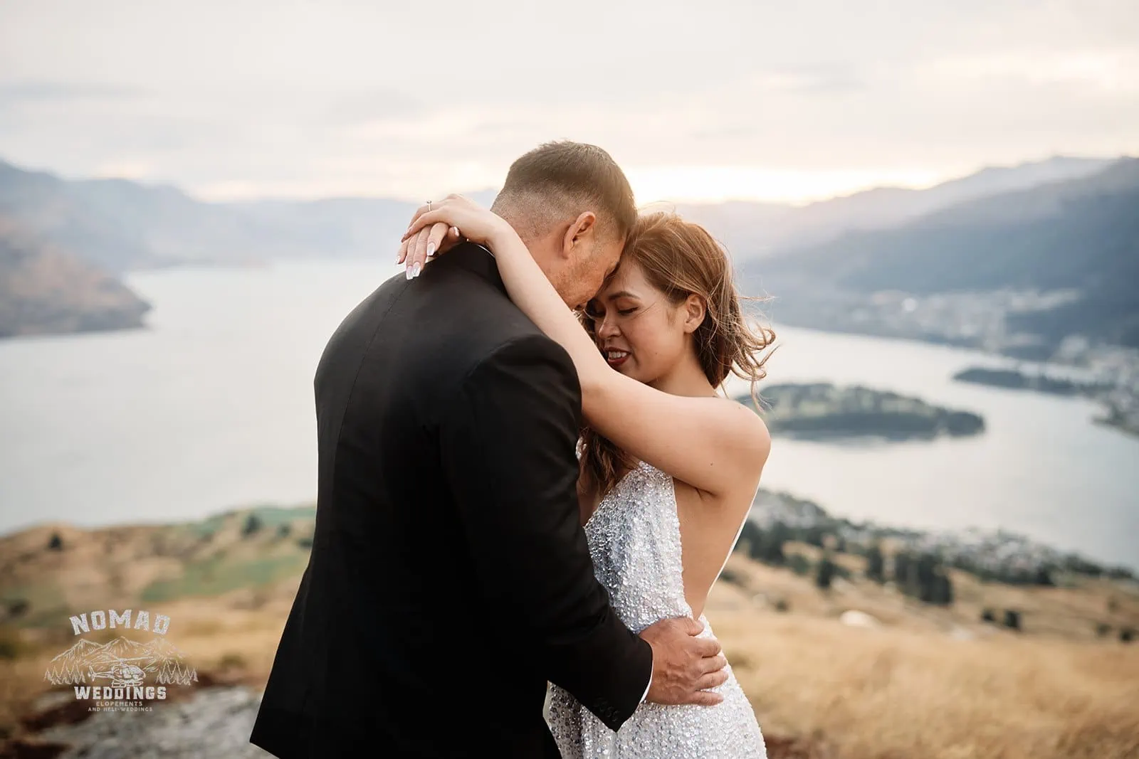 Nhi and Nicholas' pre-wedding shoot atop Queenstown's Cecil Peak overlooking lake Wanaka in NZ.