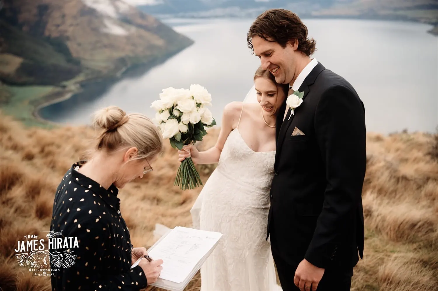 Hannah and Ross share intimate vows on a majestic New Zealand mountain during their elopement wedding in Queenstown.