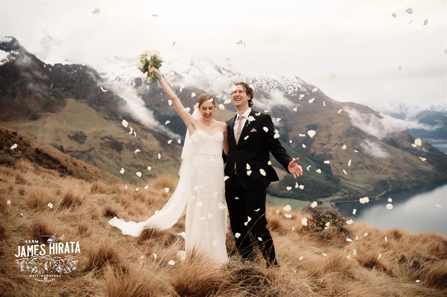 Hannah and Ross eloping on top of a mountain in Queenstown, New Zealand.