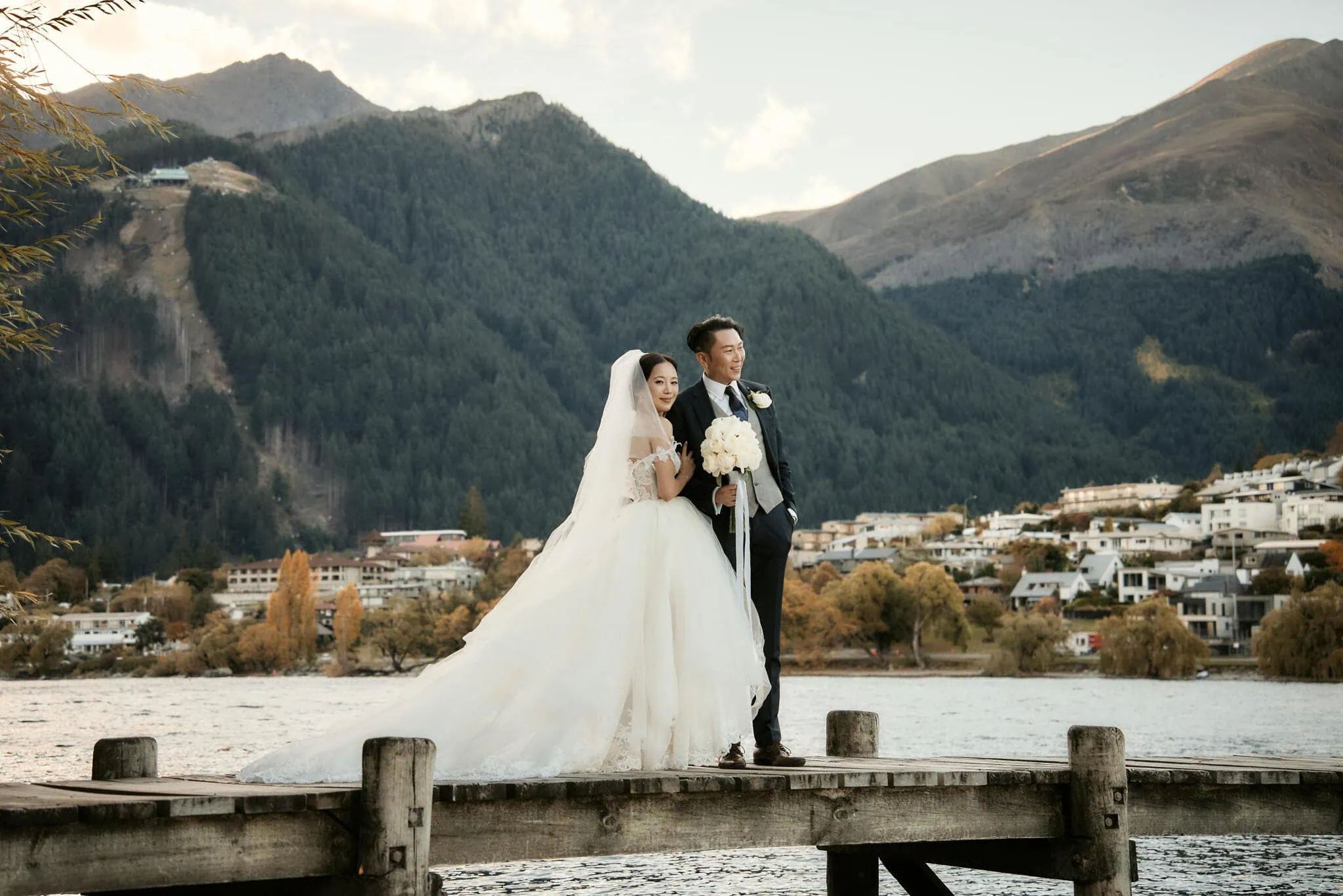 Queenstown New Zealand Elopement Wedding Photographer - Sarah and Tim's scenic Queenstown heli elopement wedding overlooking a lake in New Zealand.
