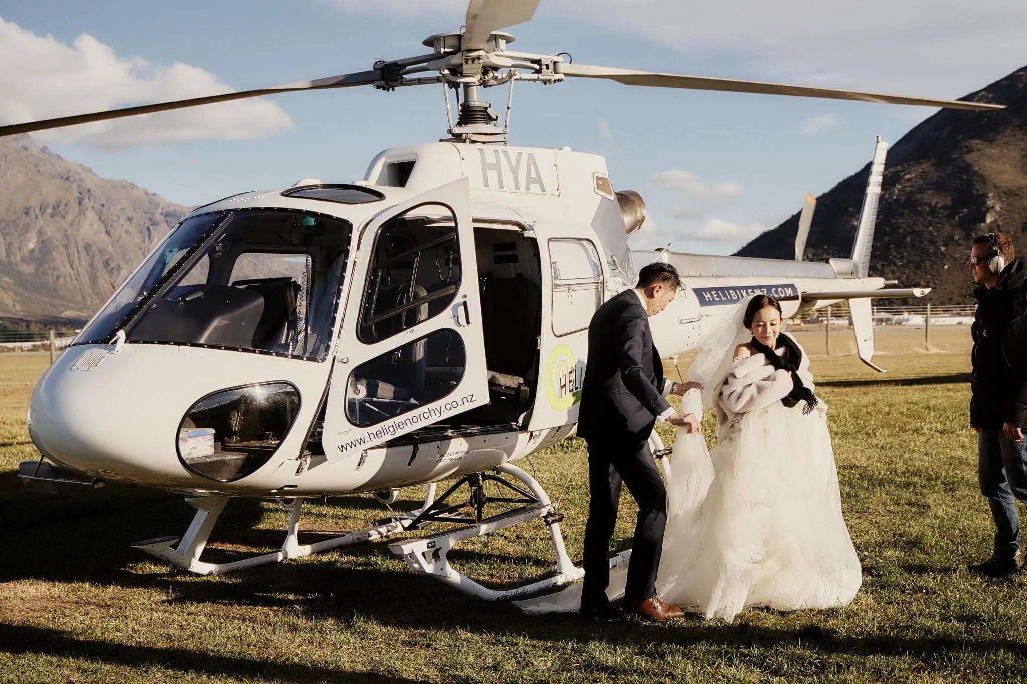 Queenstown New Zealand Elopement Wedding Photographer - Sarah and Tim embracing during their Scenic Queenstown Heli Elopement Wedding.