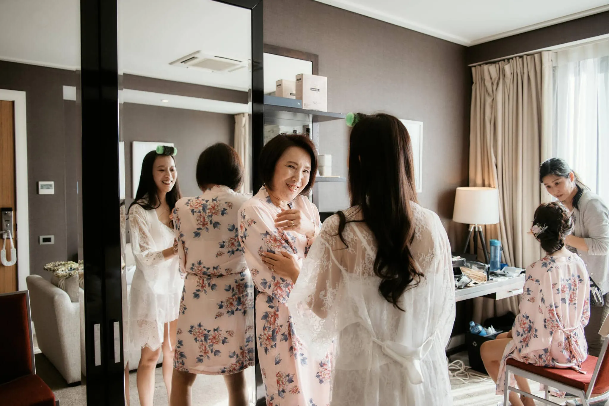 Queenstown New Zealand Elopement Wedding Photographer - Sarah and Tim getting ready in a hotel room for their Scenic Queenstown Heli Elopement Wedding.