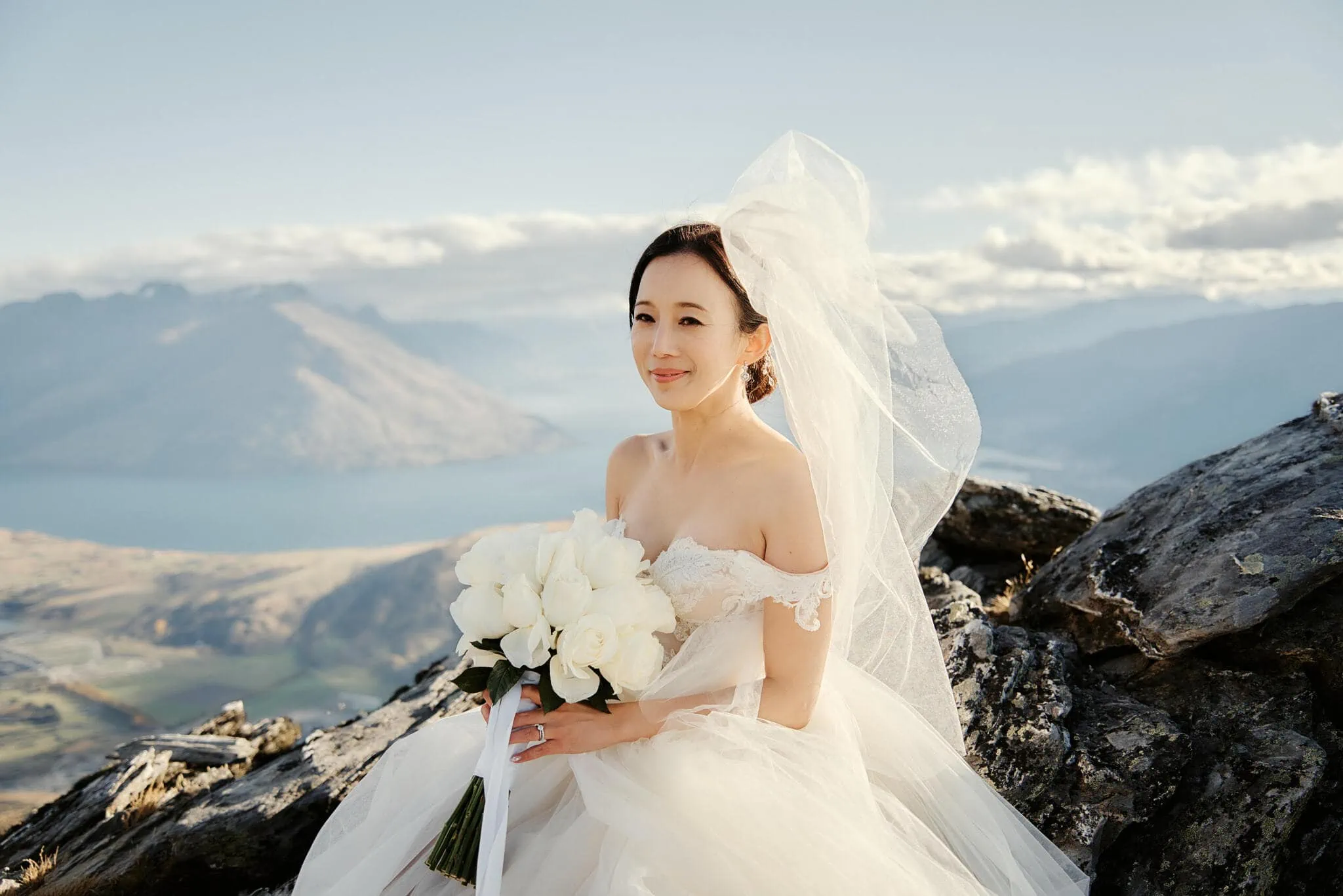 Queenstown New Zealand Elopement Wedding Photographer - Sarah and Tim elope in Queenstown, having a scenic wedding ceremony on top of a mountain via helicopter.