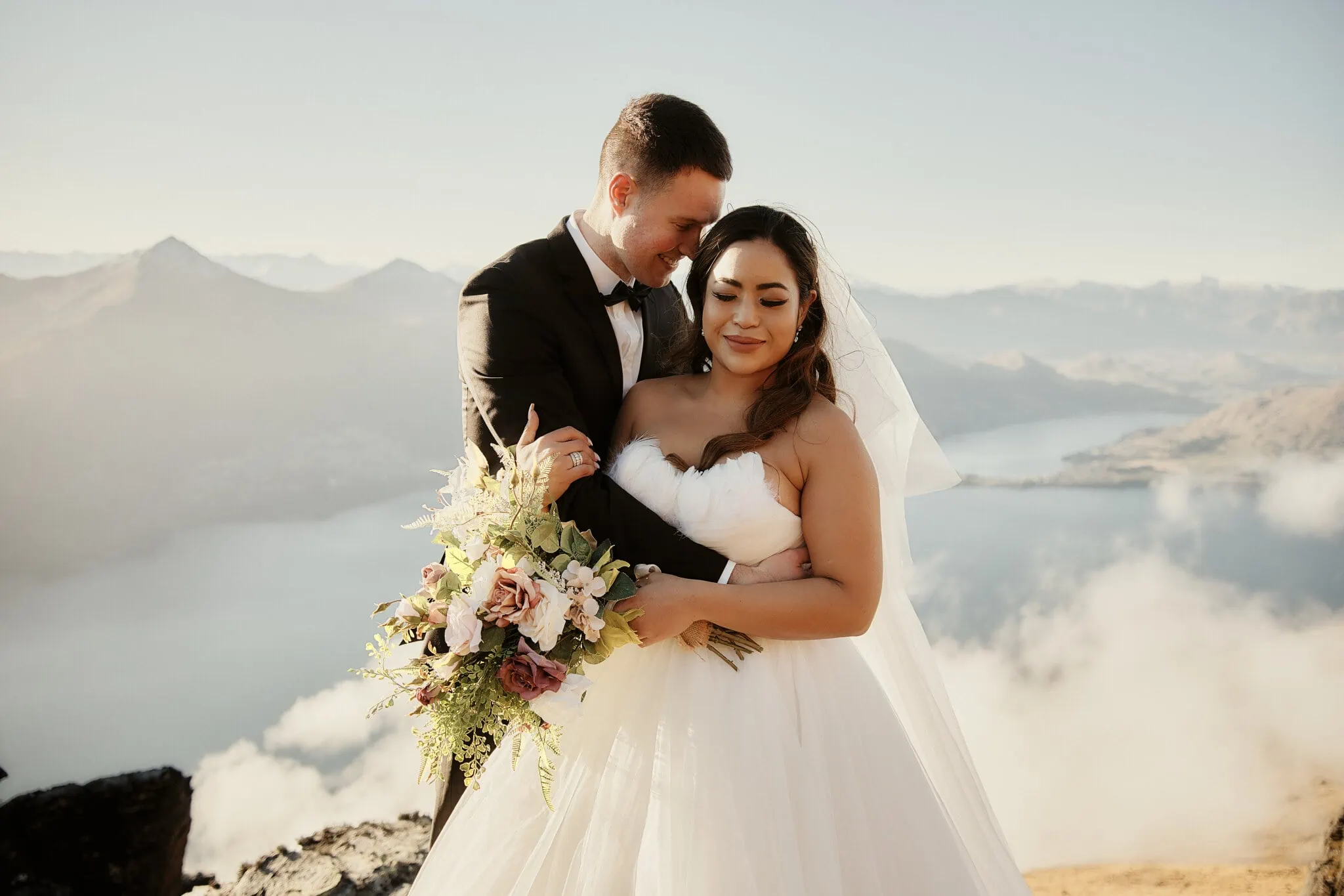 Queenstown New Zealand Elopement Wedding Photographer - Amy and Callum's queenstown wedding shoot on top of a mountain.