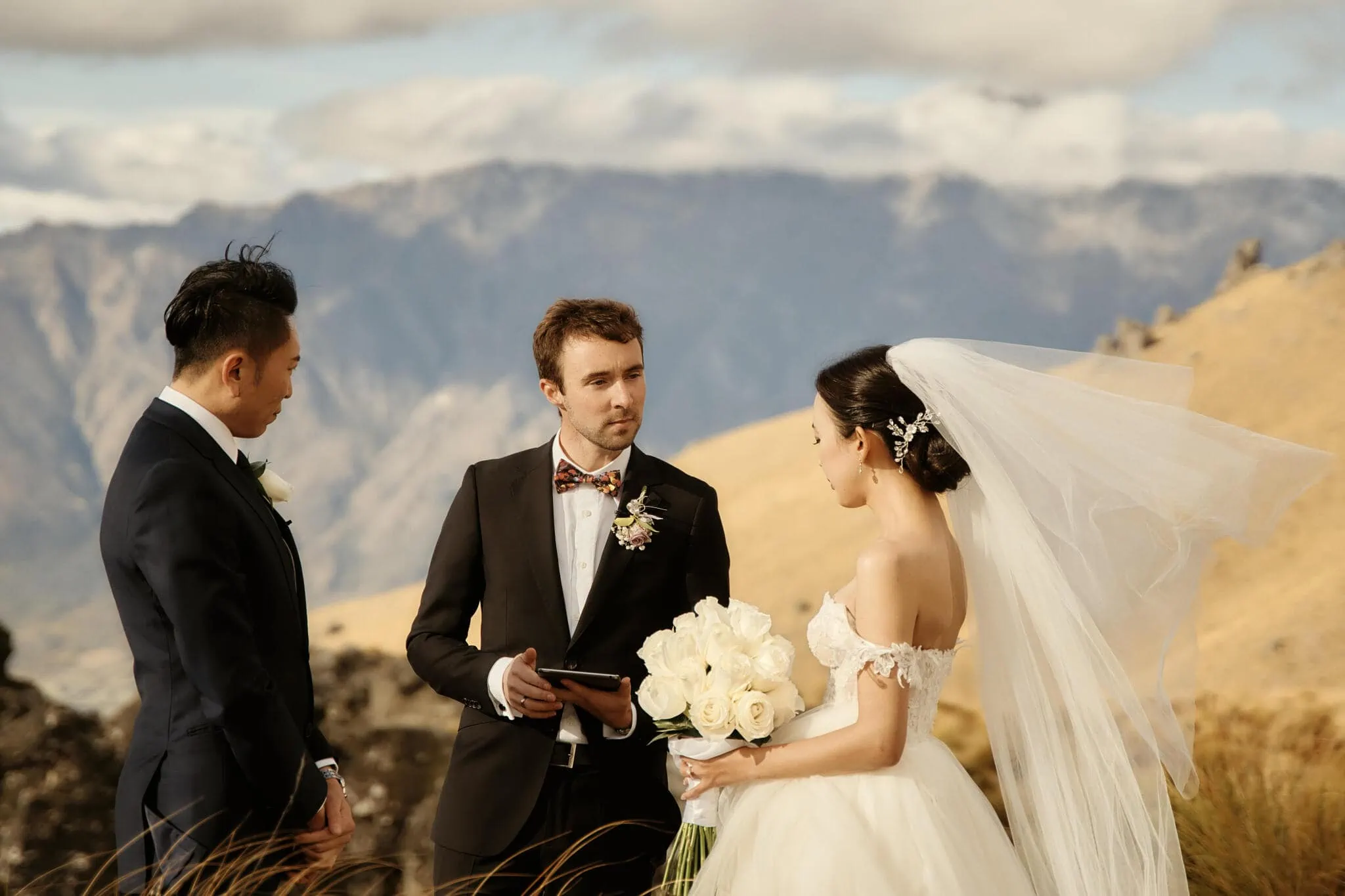 Queenstown New Zealand Elopement Wedding Photographer - Sarah and Tim have a scenic Queenstown heli elopement wedding with mountains in the background.