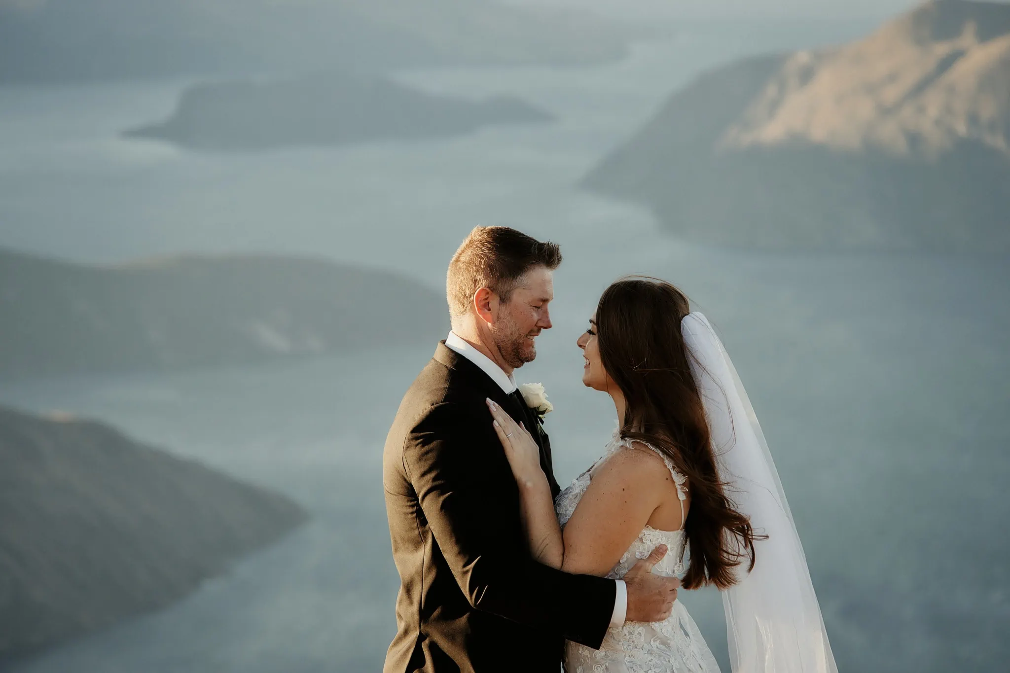 Queenstown New Zealand Elopement Wedding Photographer - Ashleigh and Anthony's elopement wedding on top of Roy's Peak overlooking a lake.