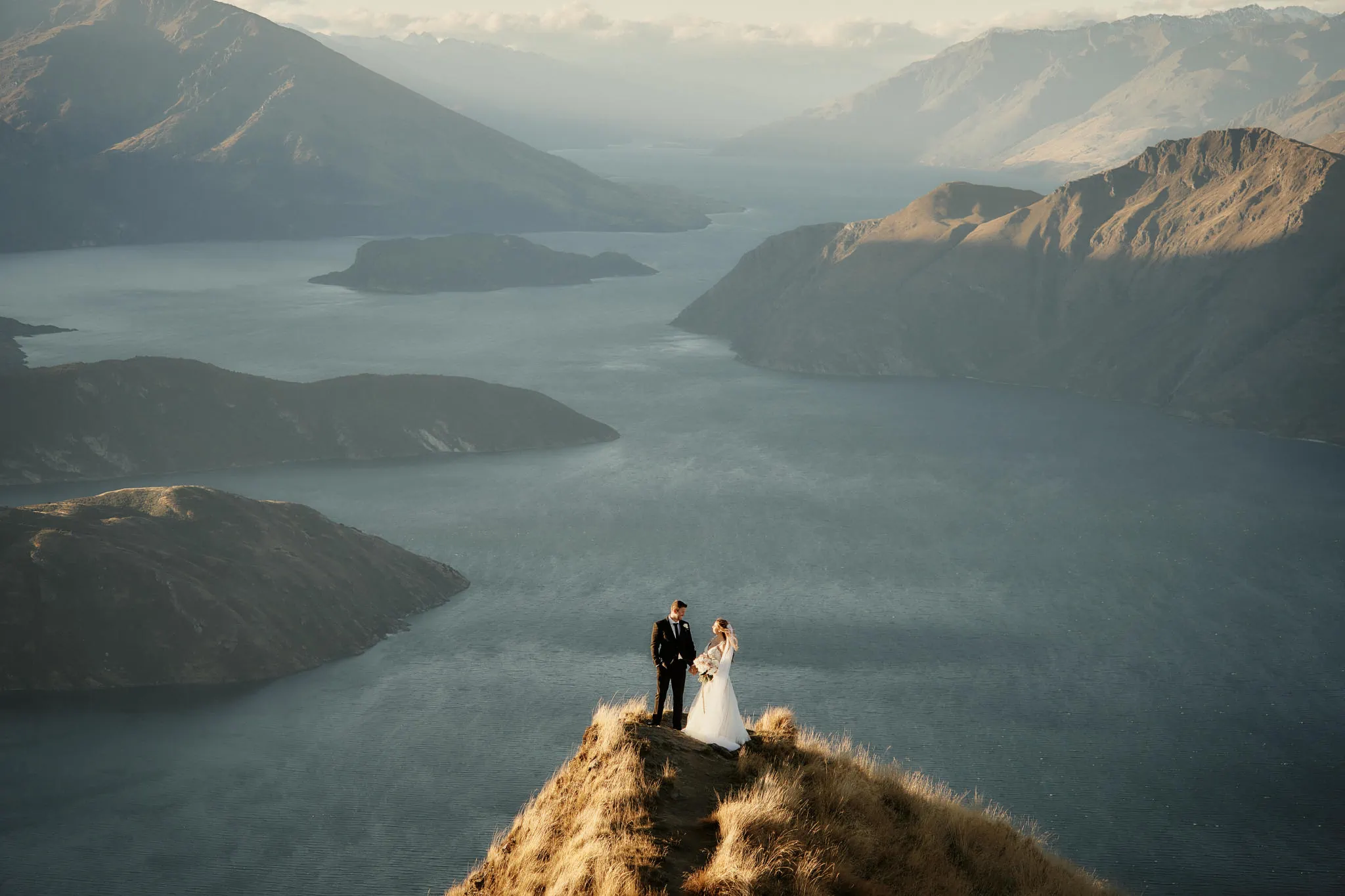 Queenstown New Zealand Elopement Wedding Photographer - A couple, Ashleigh and Anthony, have their elopement wedding on Roy's Peak, a mountain overlooking Lake Wanaka.