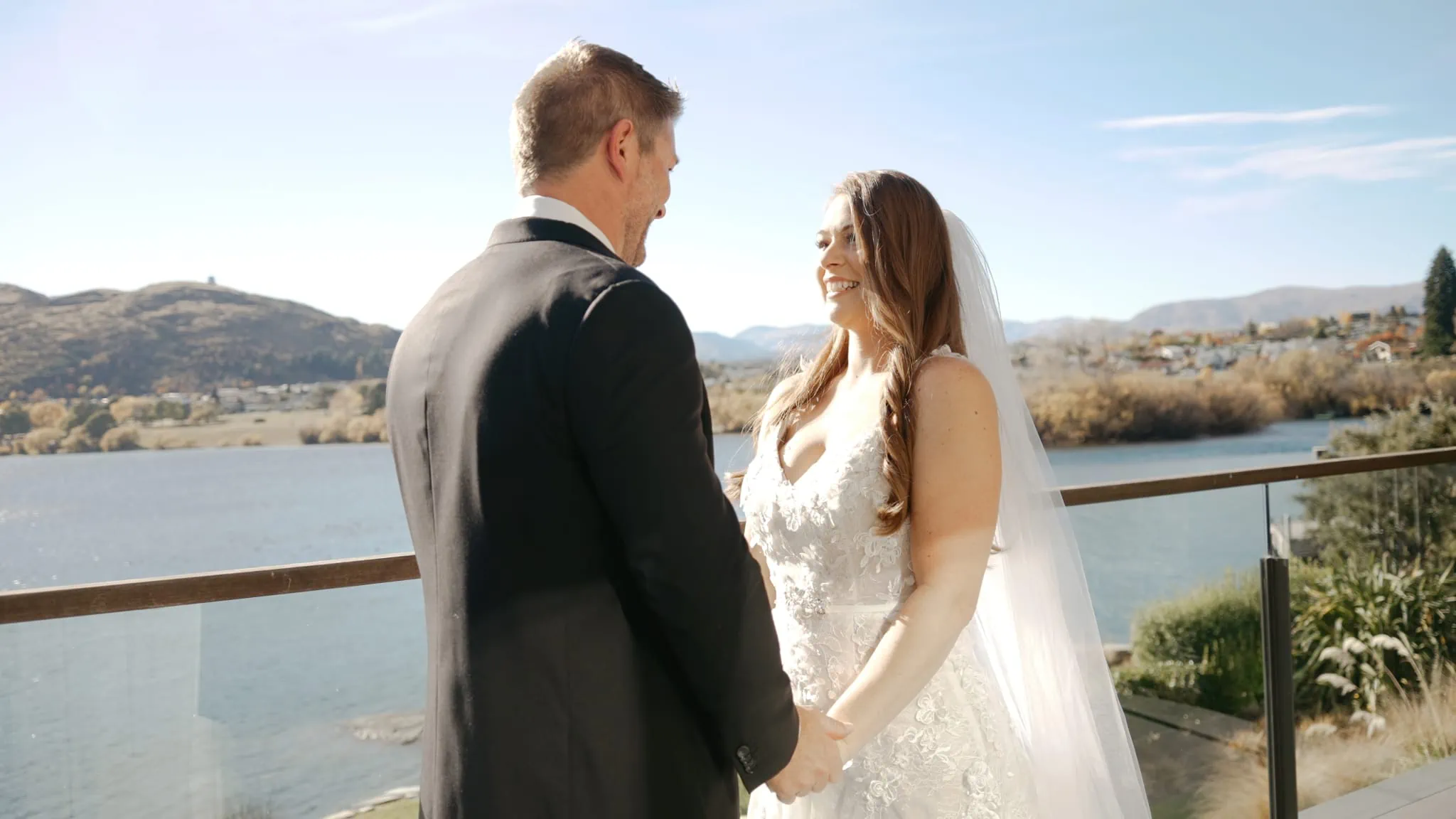 Queenstown New Zealand Elopement Wedding Photographer - Ashleigh and Anthony's Roy's Peak Heli Elopement Wedding on a lake-view balcony.