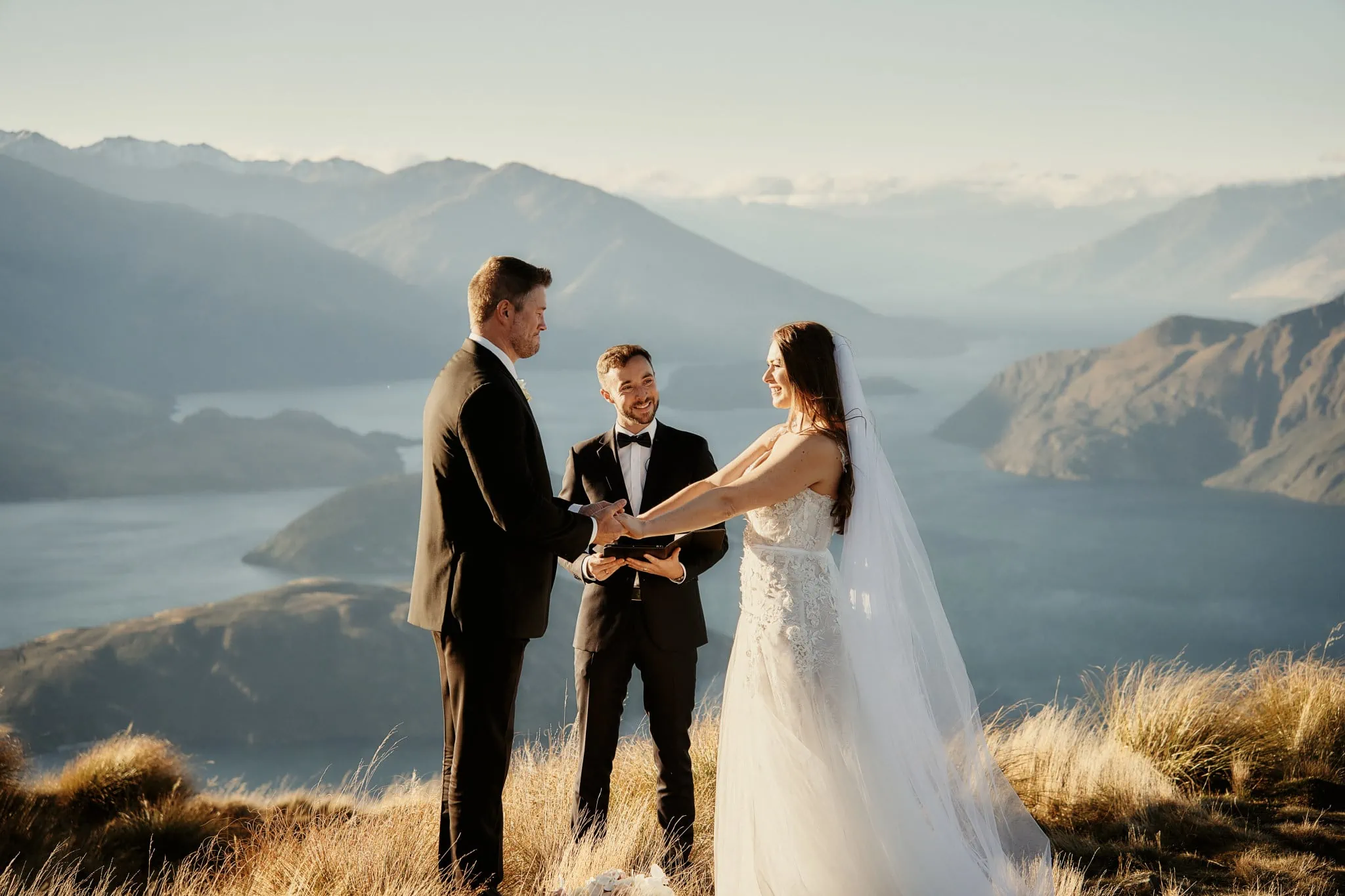 Queenstown New Zealand Elopement Wedding Photographer - Ashleigh and Anthony's elopement wedding takes place on top of Roy's Peak mountain in New Zealand.