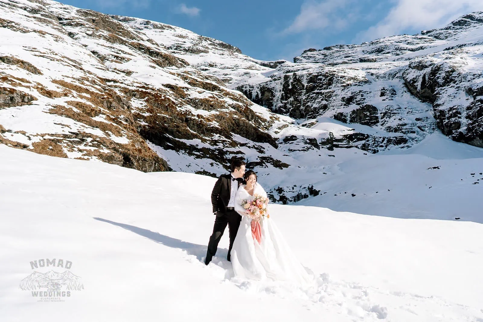 Queenstown New Zealand Elopement Wedding Photographer - Bo and Junyi embark on a snowy heli pre-wedding shoot with stunning mountain backdrops and four exhilarating landings.