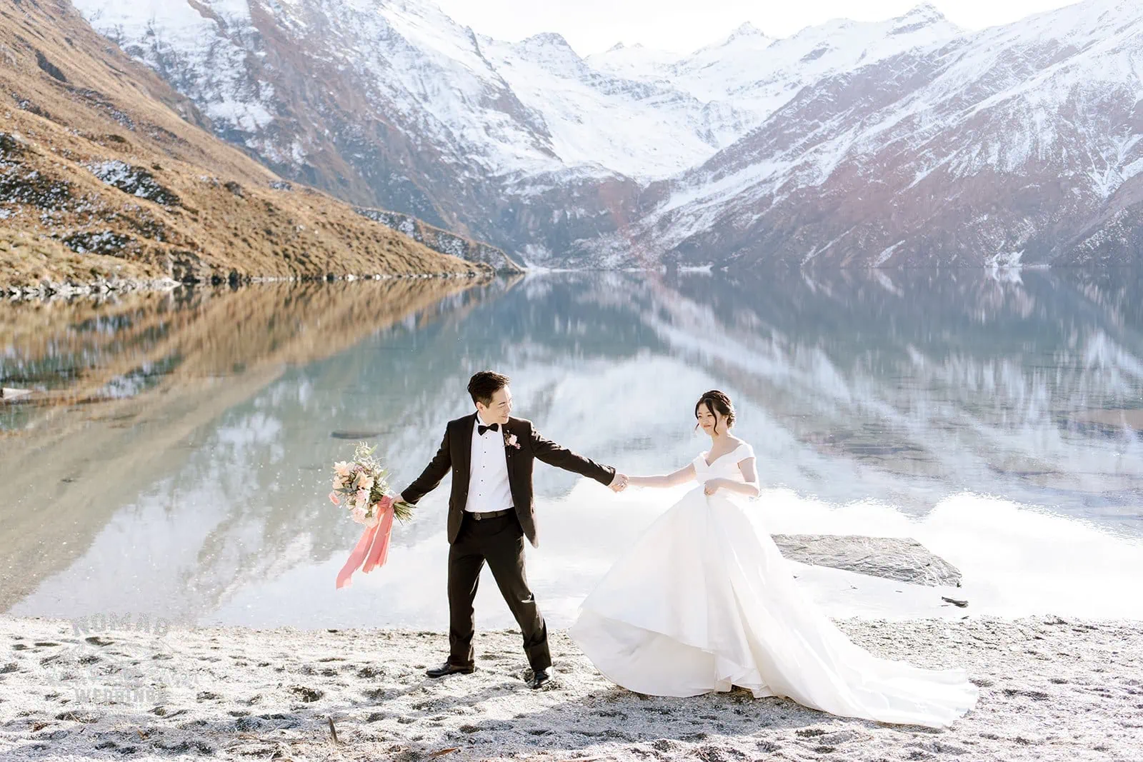 Queenstown New Zealand Elopement Wedding Photographer - Bo and Junyi's Heli Pre Wedding Shoot amidst picturesque mountains and a serene lake.