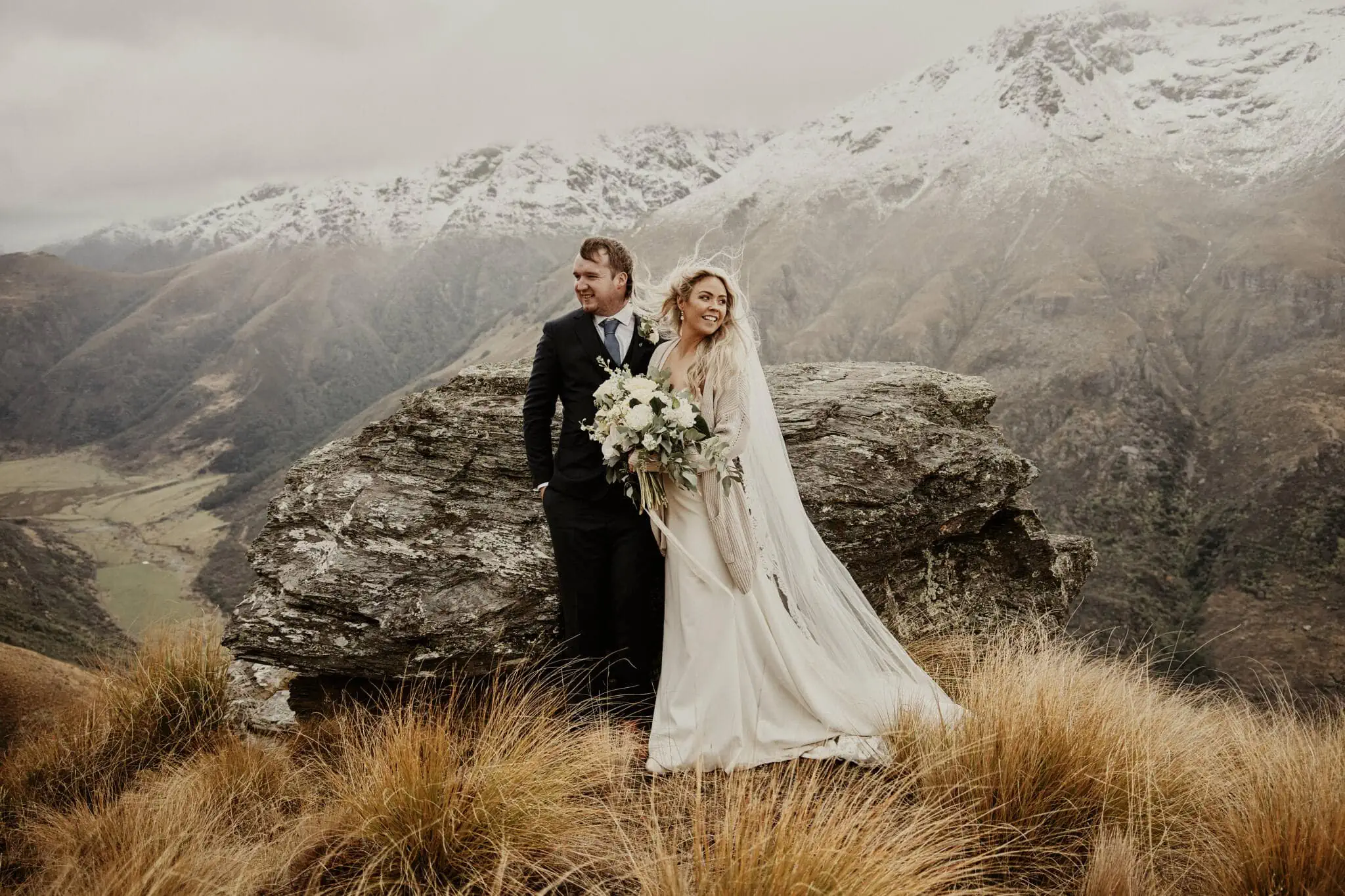 Queenstown New Zealand Elopement Wedding Photographer - Rebecca and Dylan's enchanting Moke Lake elopement wedding atop a mountain in New Zealand.