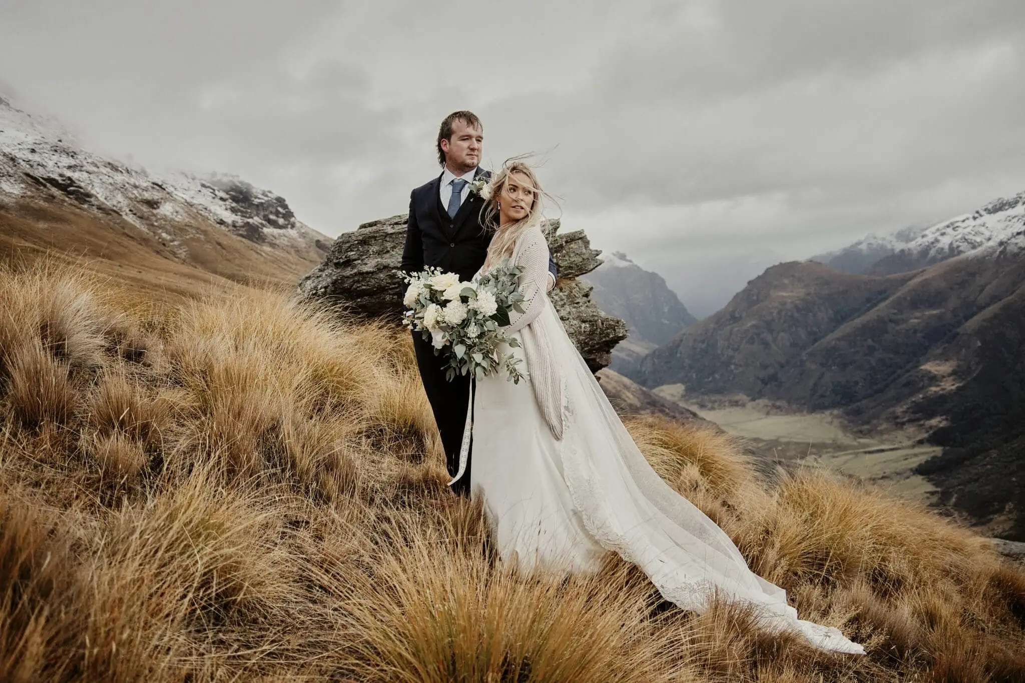 Queenstown New Zealand Elopement Wedding Photographer - Rebecca and Dylan's Enchanting Moke Lake Elopement Wedding on top of a mountain in New Zealand.