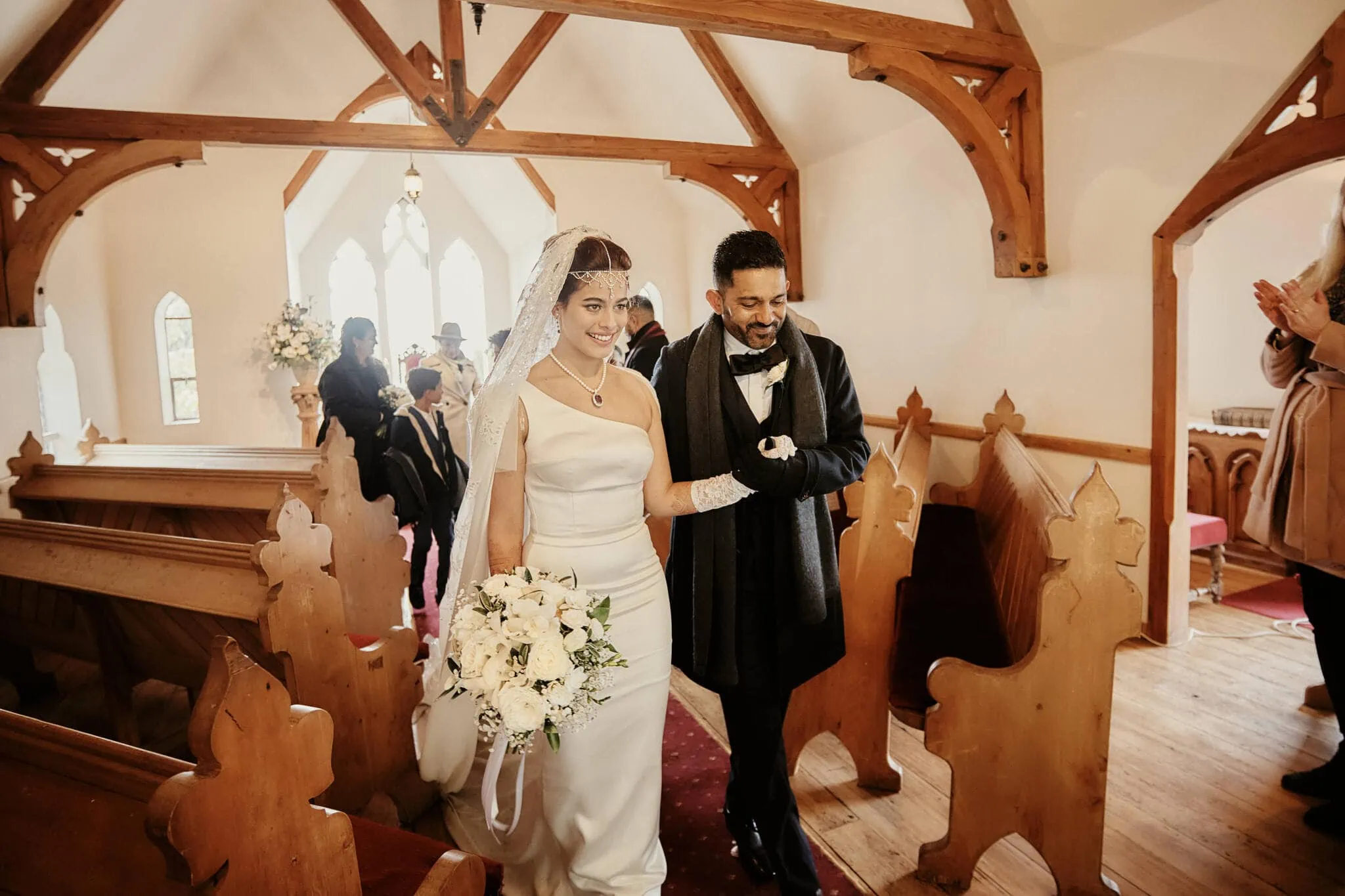 Queenstown New Zealand Elopement Wedding Photographer - Wasim and Yumn's Queenstown Islamic wedding, walking down the aisle of a church.