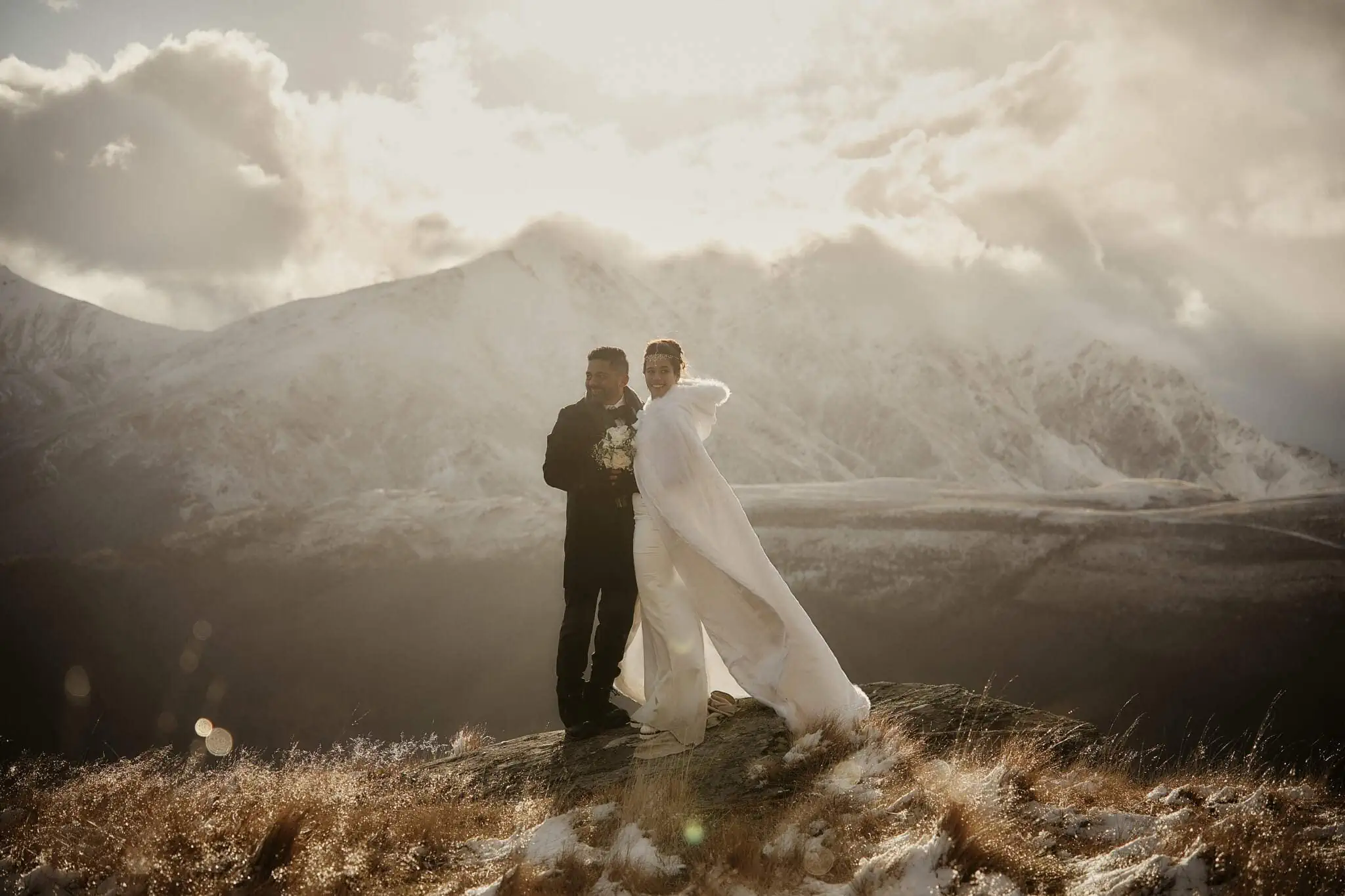 Queenstown New Zealand Elopement Wedding Photographer - Wasim and Yumn's Islamic wedding takes place on a hill with snowy mountains in the background in Queenstown.