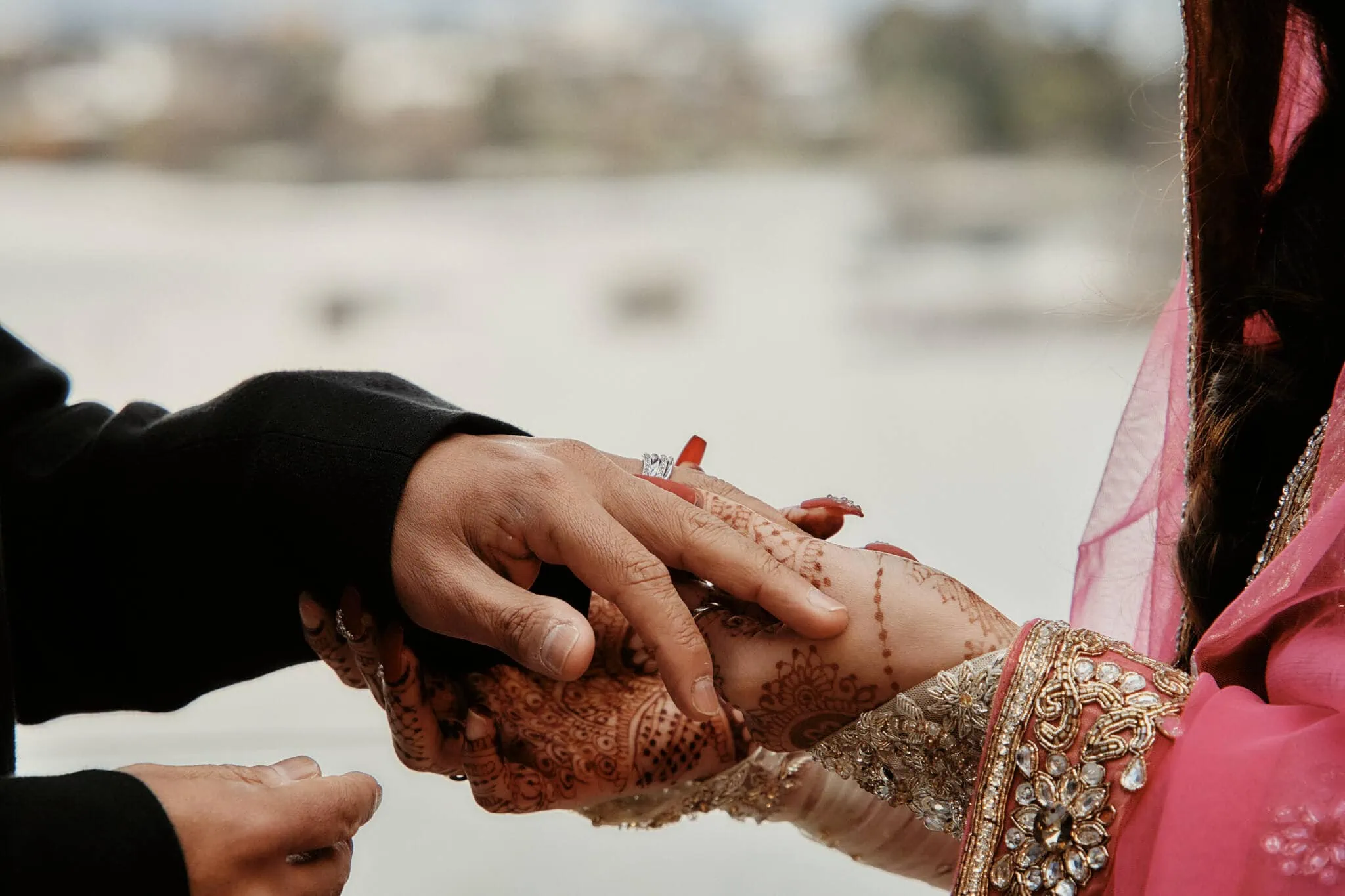 Queenstown New Zealand Elopement Wedding Photographer - Wasim and Yumn's Queenstown Islamic Wedding features a loving moment as they join their hands together.