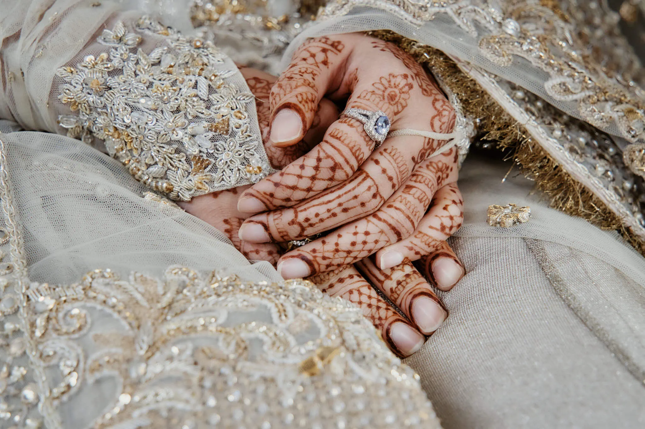 Queenstown New Zealand Elopement Wedding Photographer - A bride's hands adorned with henna at the Queenstown Islamic Wedding of Wasim and Yumn.