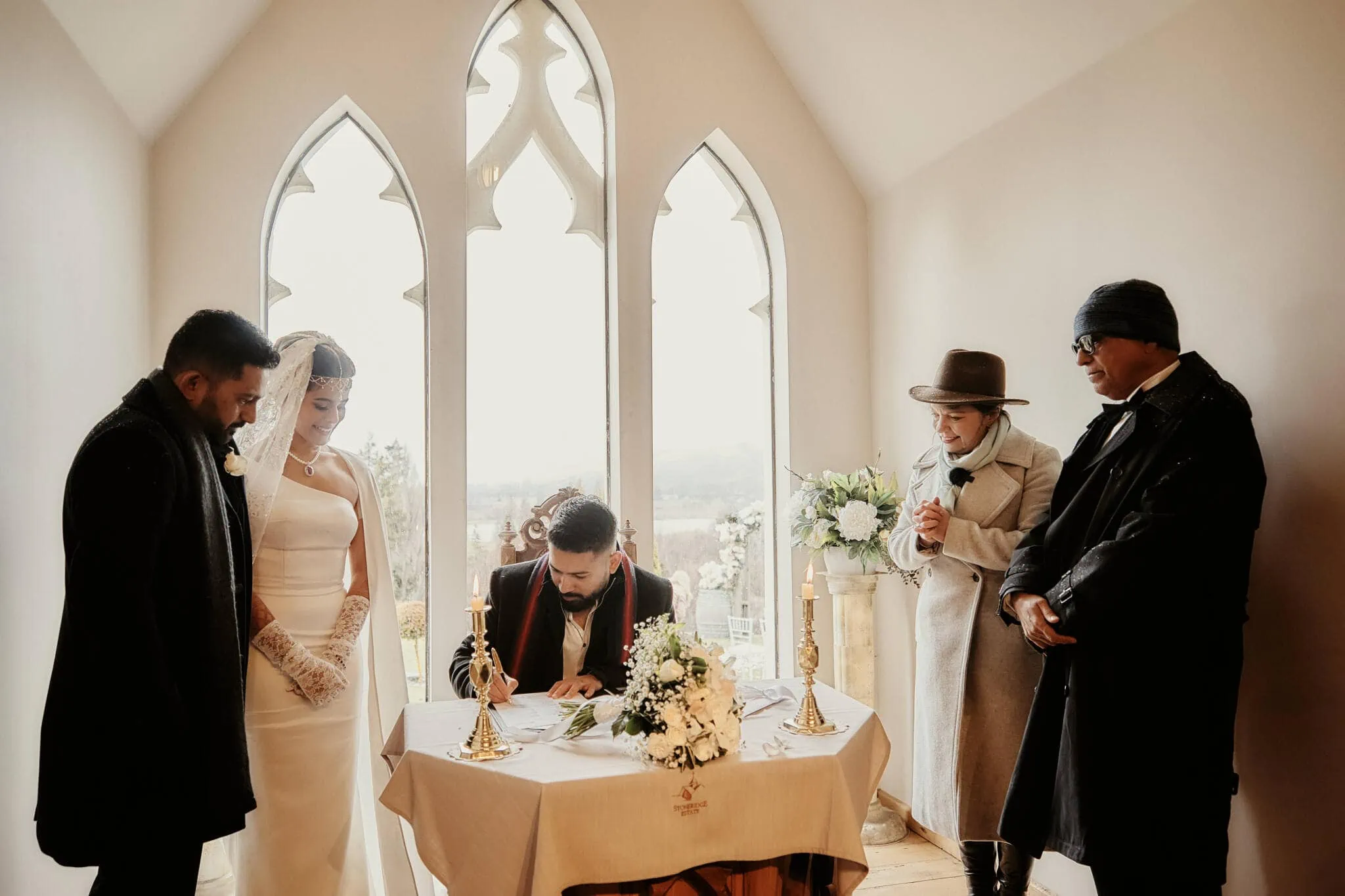 Queenstown New Zealand Elopement Wedding Photographer - Wasim and Yumn signing their Islamic wedding vows in Queenstown.