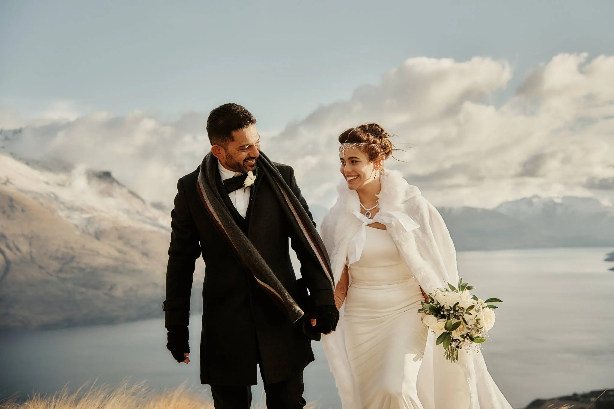 Queenstown New Zealand Elopement Wedding Photographer - Keywords: Queenstown, Islamic Wedding

Description: A Muslim couple named Wasim and Yumn exchanging vows on top of a mountain in Queenstown, New Zealand.