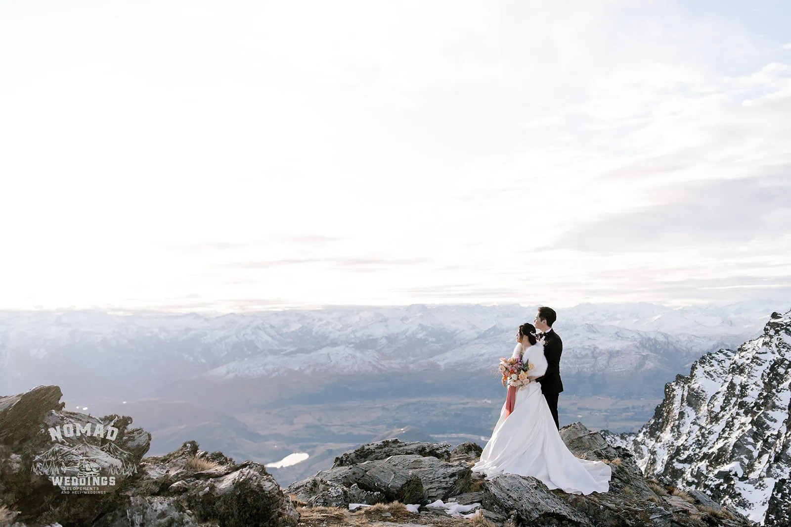 Queenstown New Zealand Elopement Wedding Photographer - Bo and Junyi, a couple, having a heli pre wedding shoot with 4 landings on top of a mountain in New Zealand.